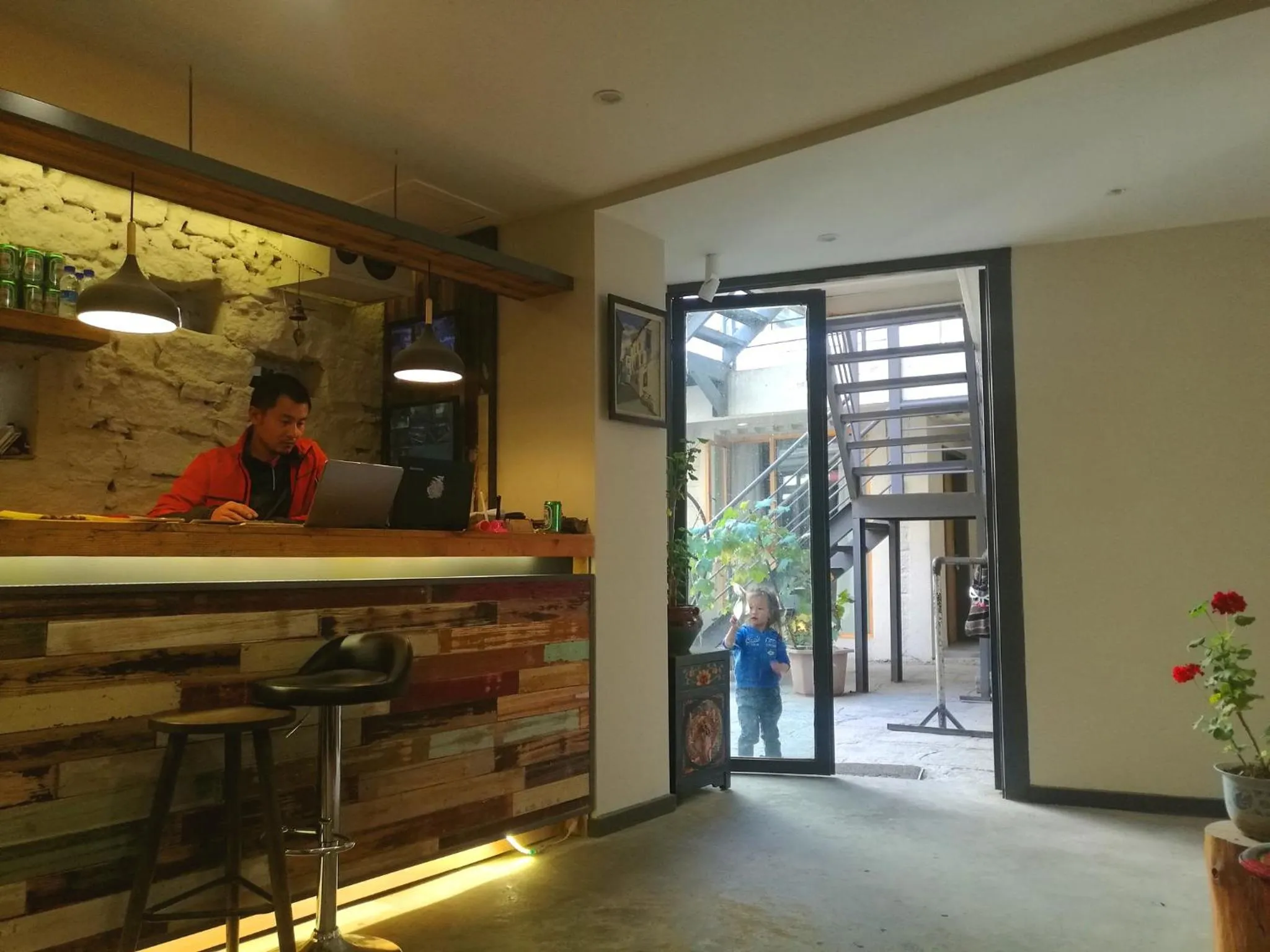 Staff in Fengma Feiyang Hostel