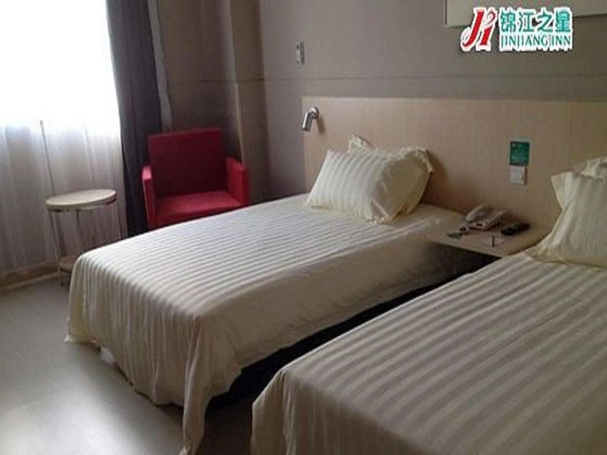Bedroom, Bed in Jinjiang Inn Beihai Beibu Gulf Square