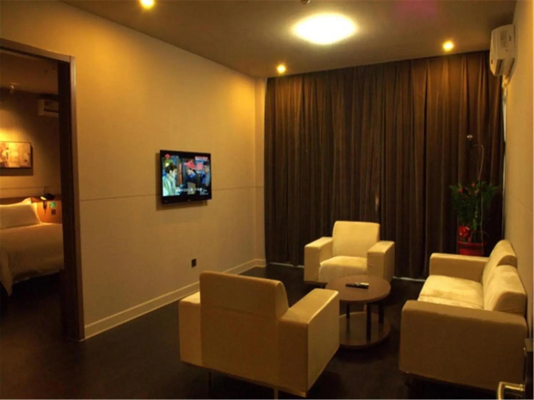 Living room, Bed in Jinjiang Inn Xiamen Jimei University Guomao Living room, Bed in Jinjiang Inn Xiamen Jimei University Guomao