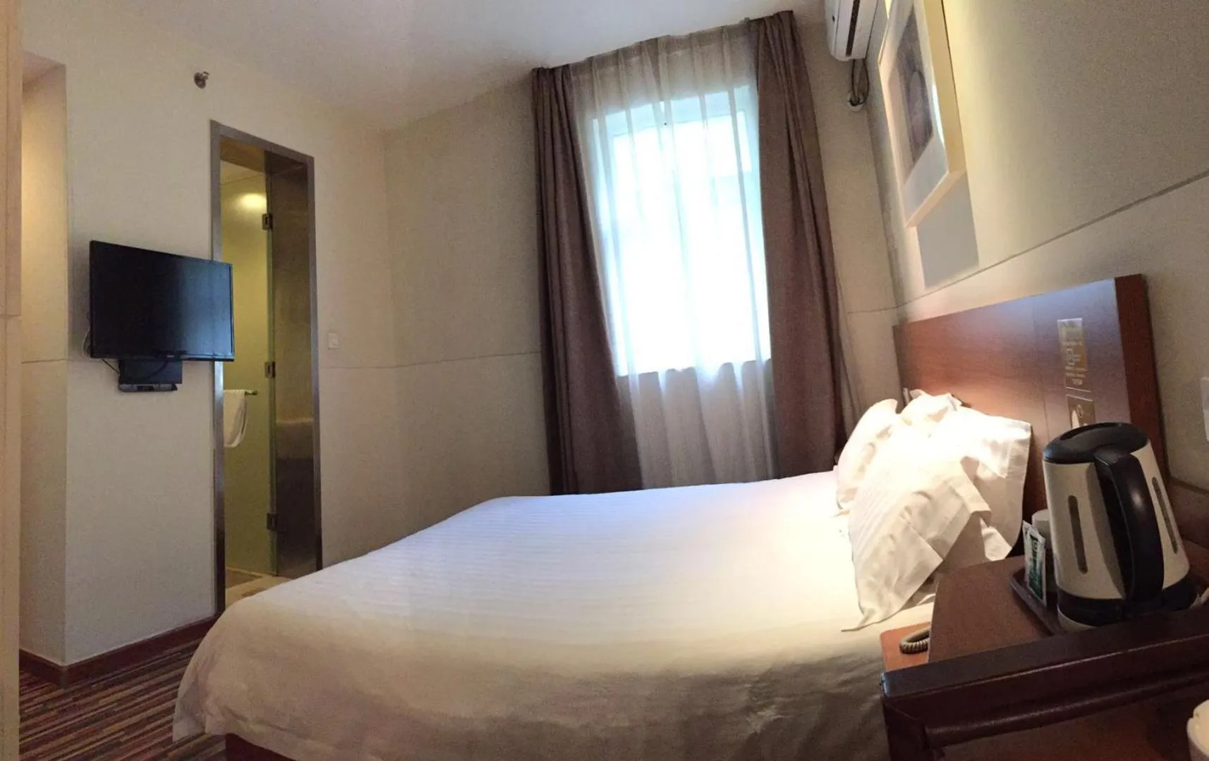 Photo of the whole room, Bed in Goldmet Inn Changzhi Bayi Square