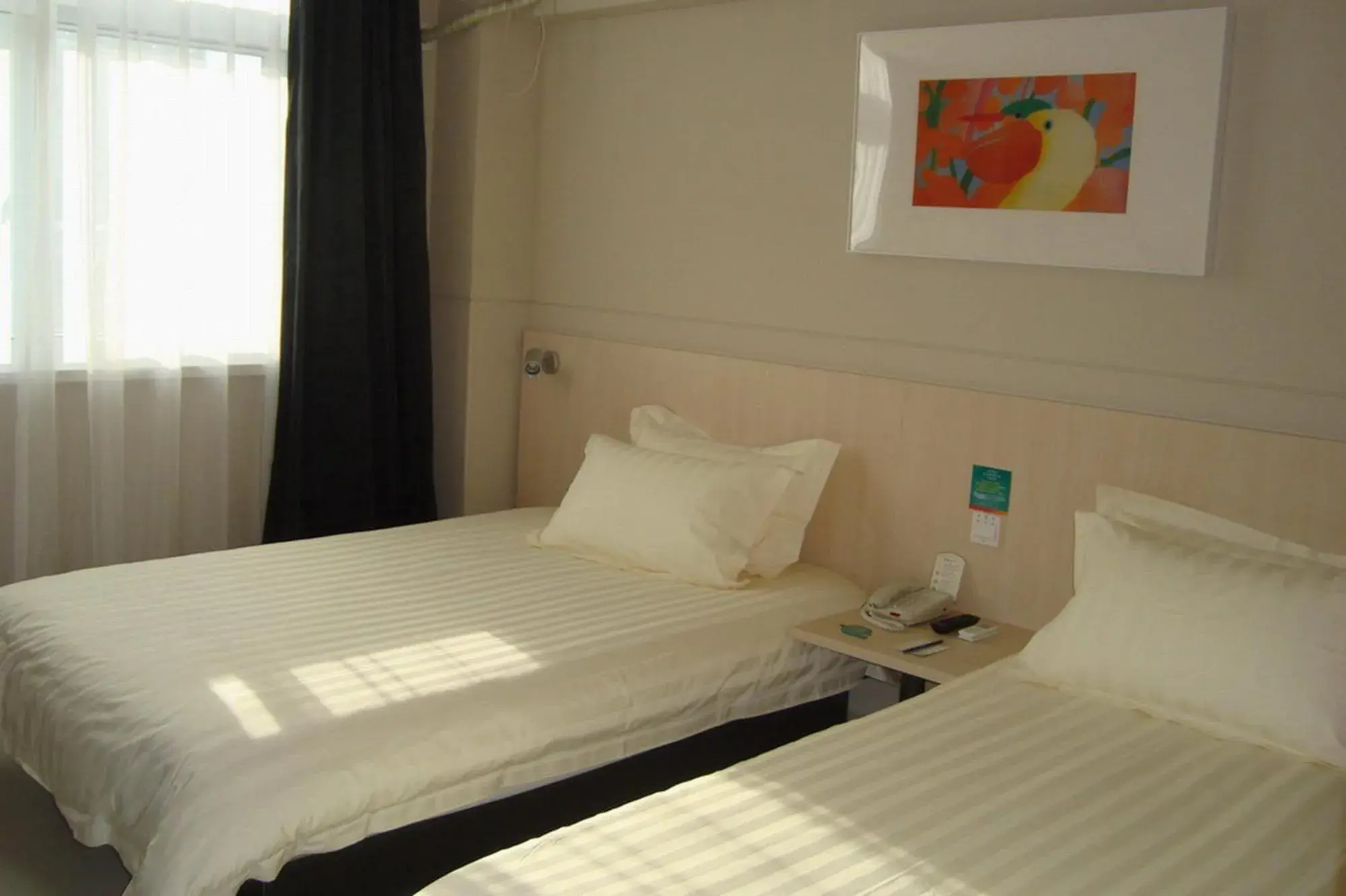 Bed in Jinjiang Inn Wanda Plaza Hotel Taiyuan Street Shenyang Bed in Jinjiang Inn Wanda Plaza Hotel Taiyuan Street Shenyang