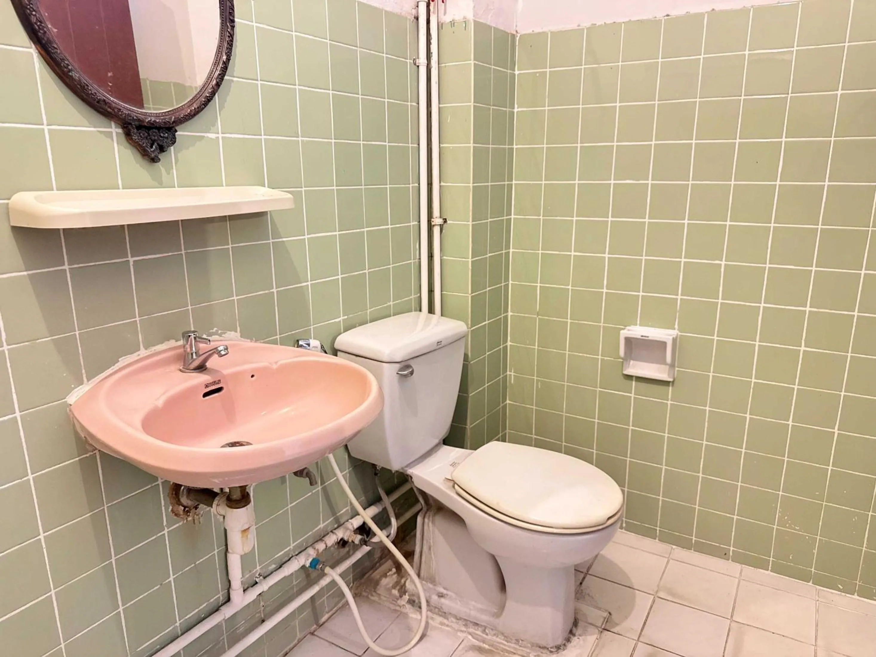 Bathroom in Hotel O Top North Guesthouse