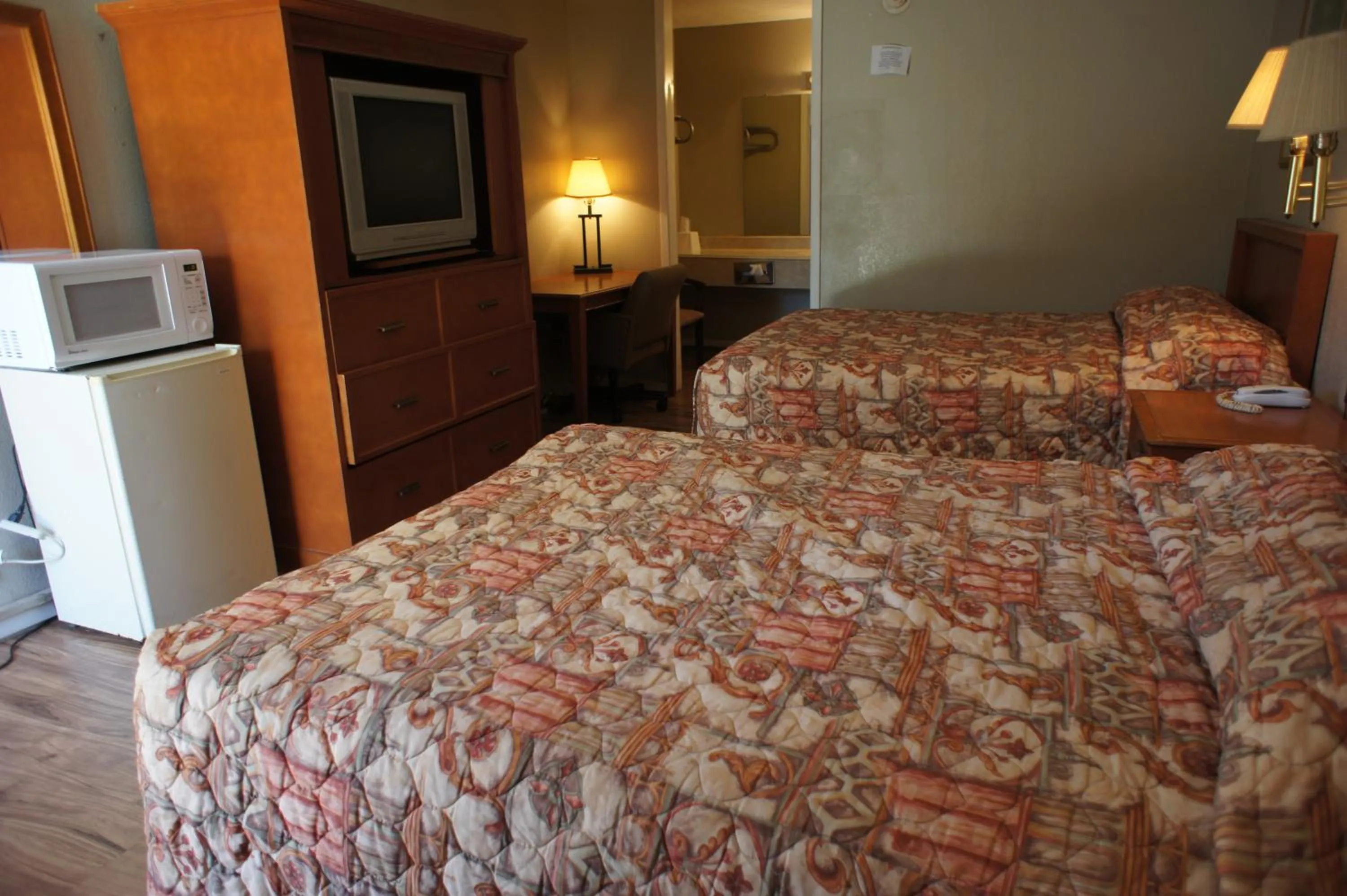 Bed in Executive Inn & Suites