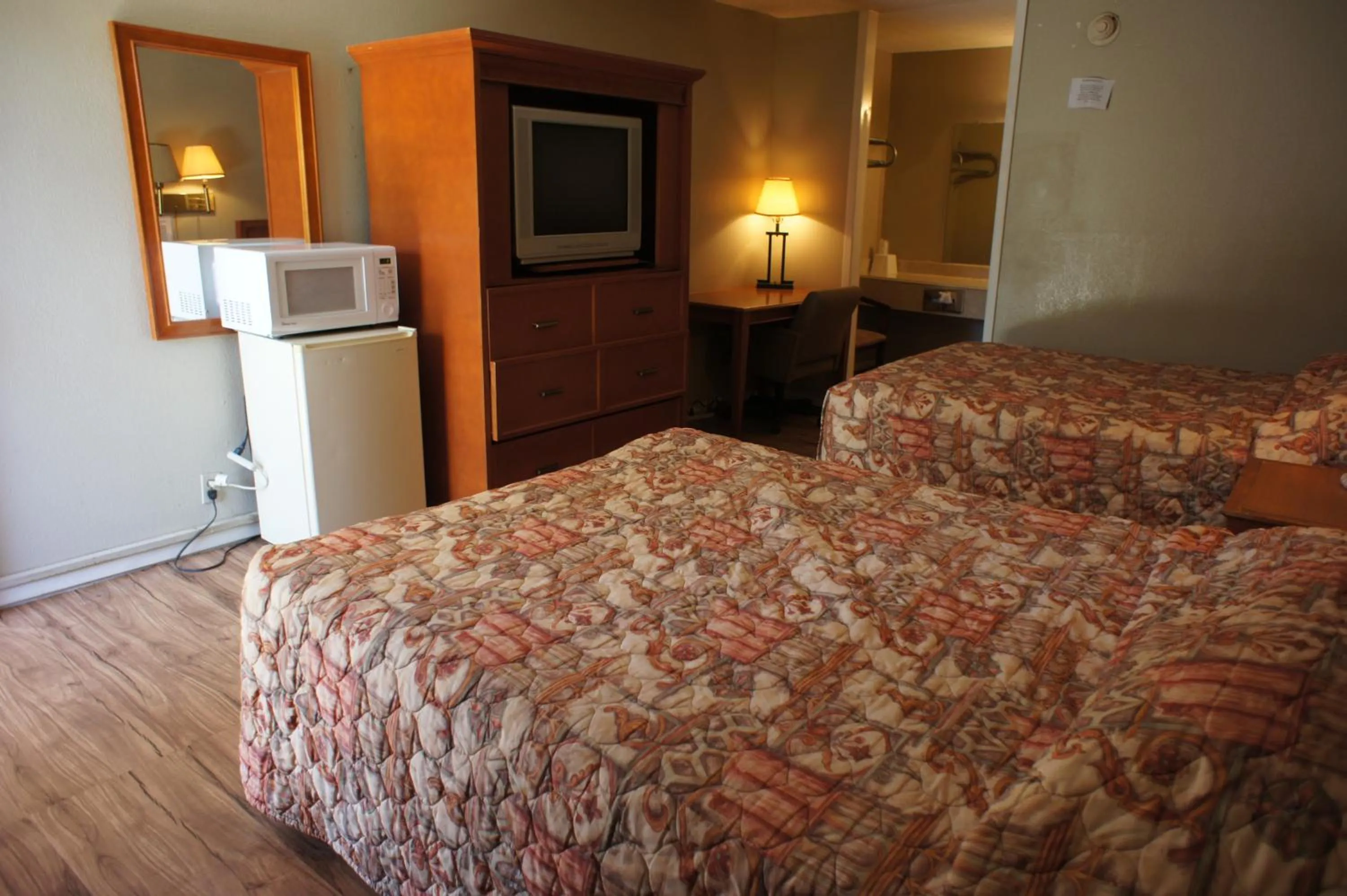 Bed in Executive Inn & Suites