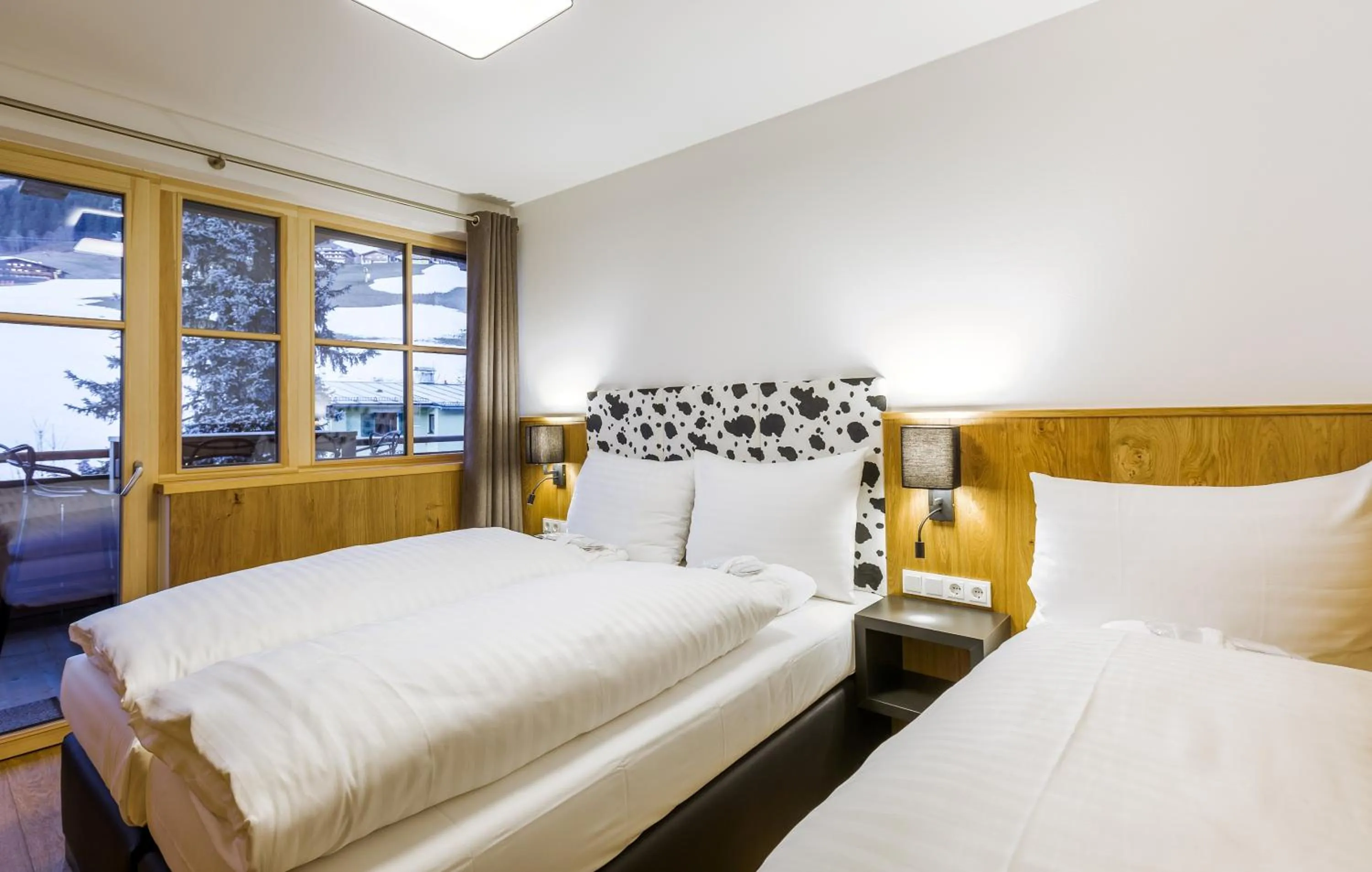 Bed in Bolodges Apartments by Alpin Rentals