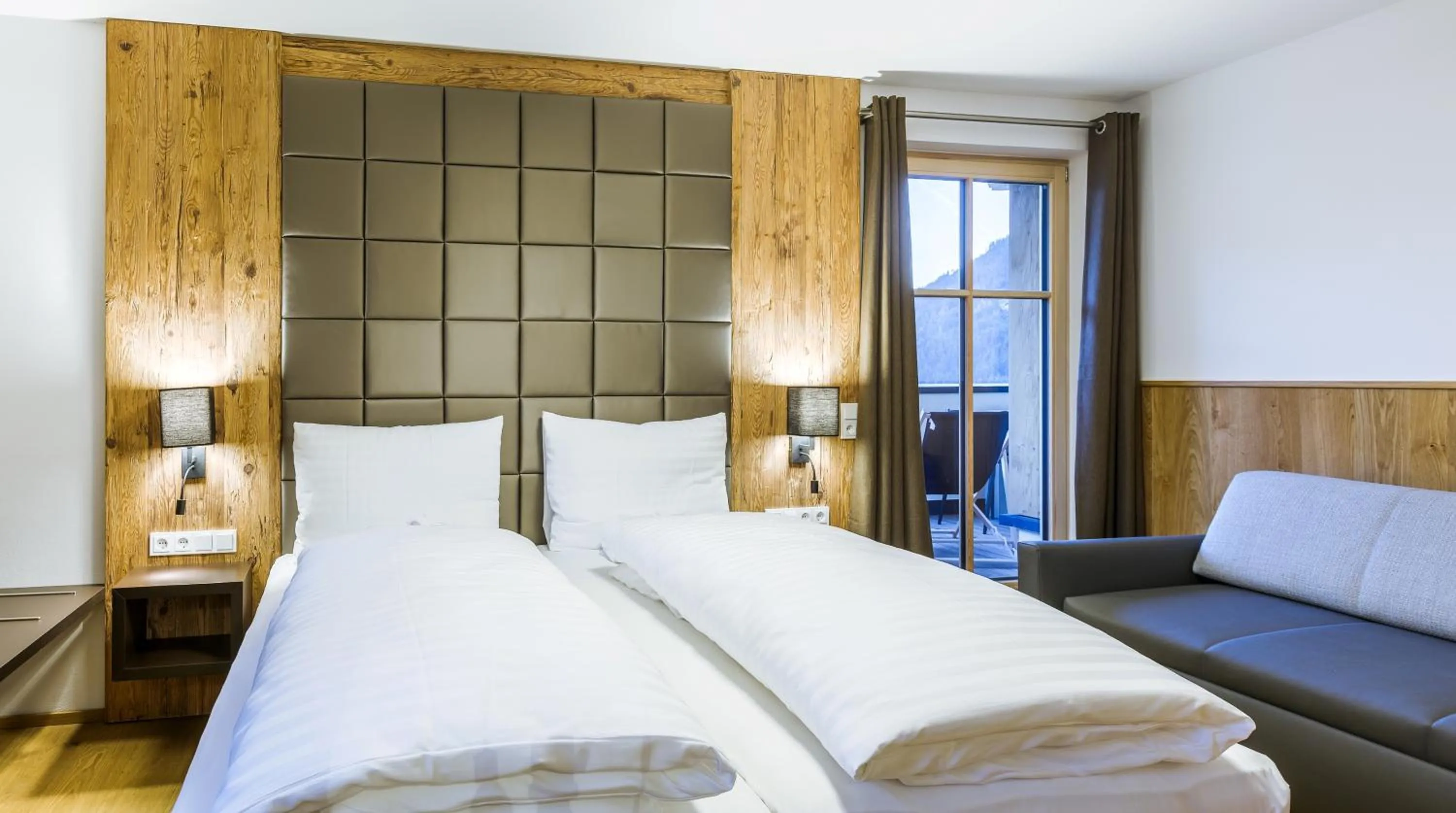 Bed in Bolodges Apartments by Alpin Rentals