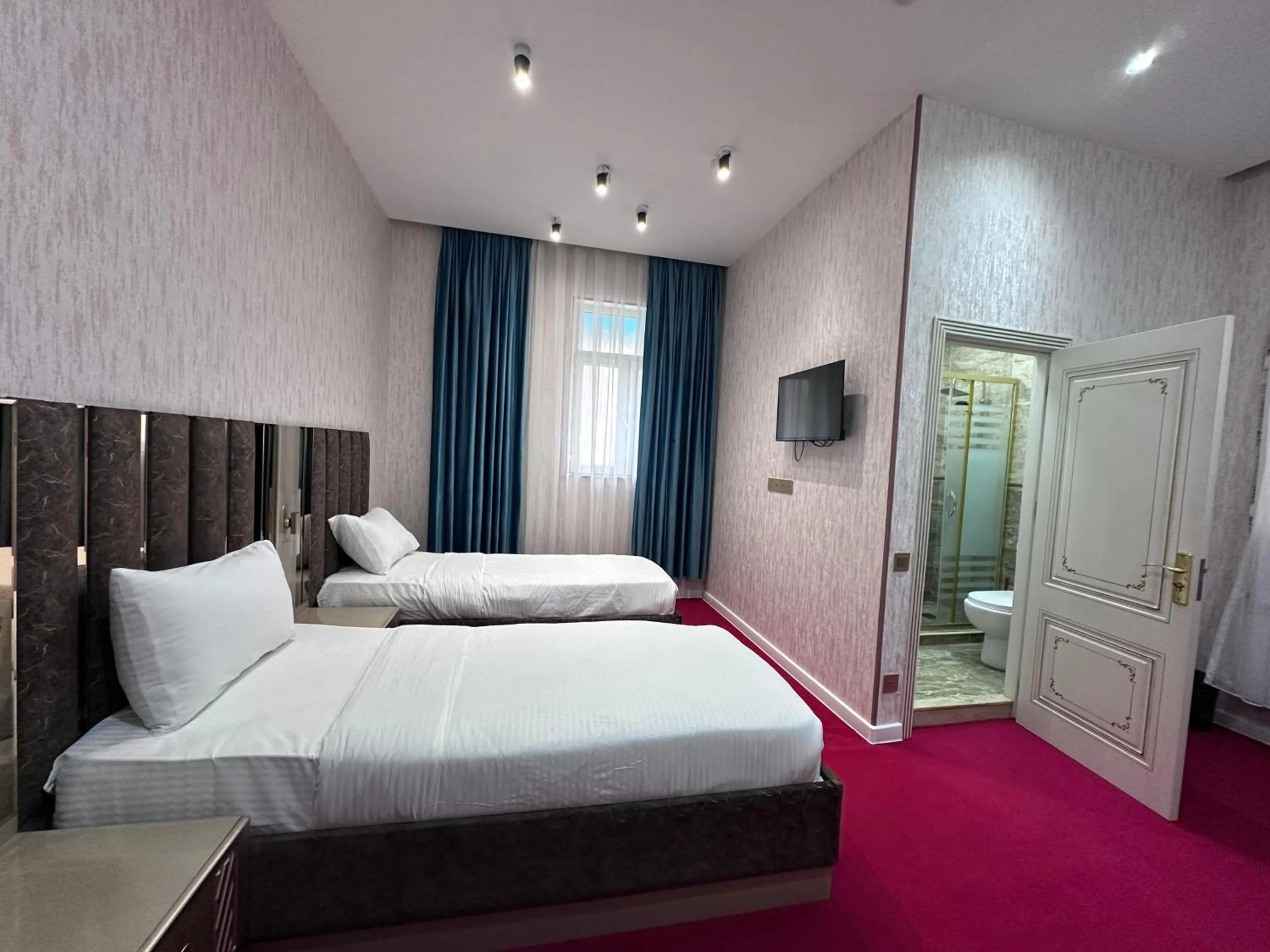 Bed in Central City Hotel