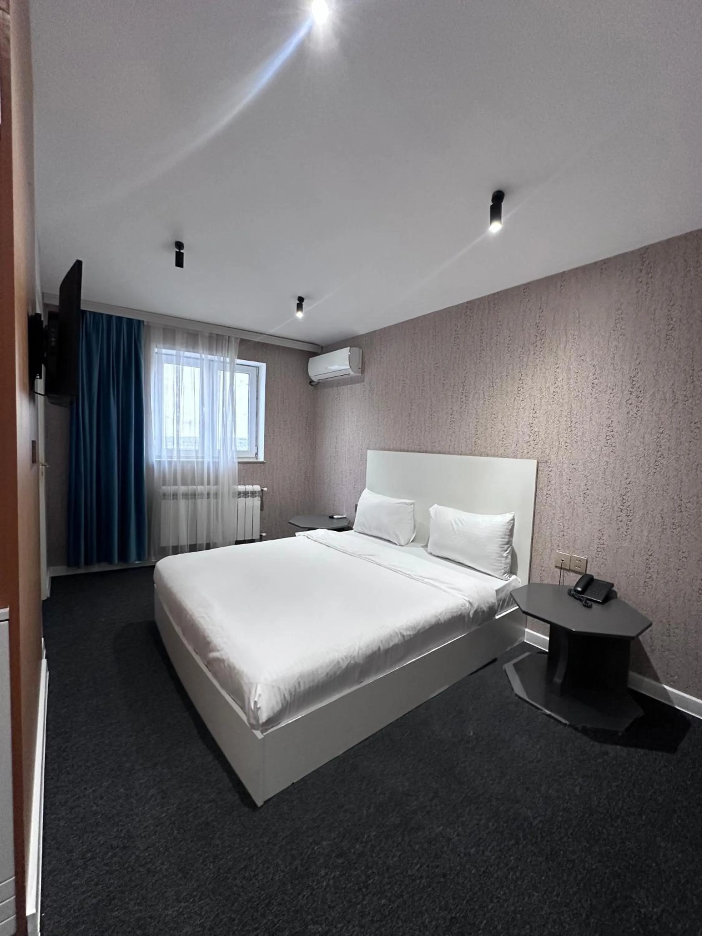 Bed in Central City Hotel