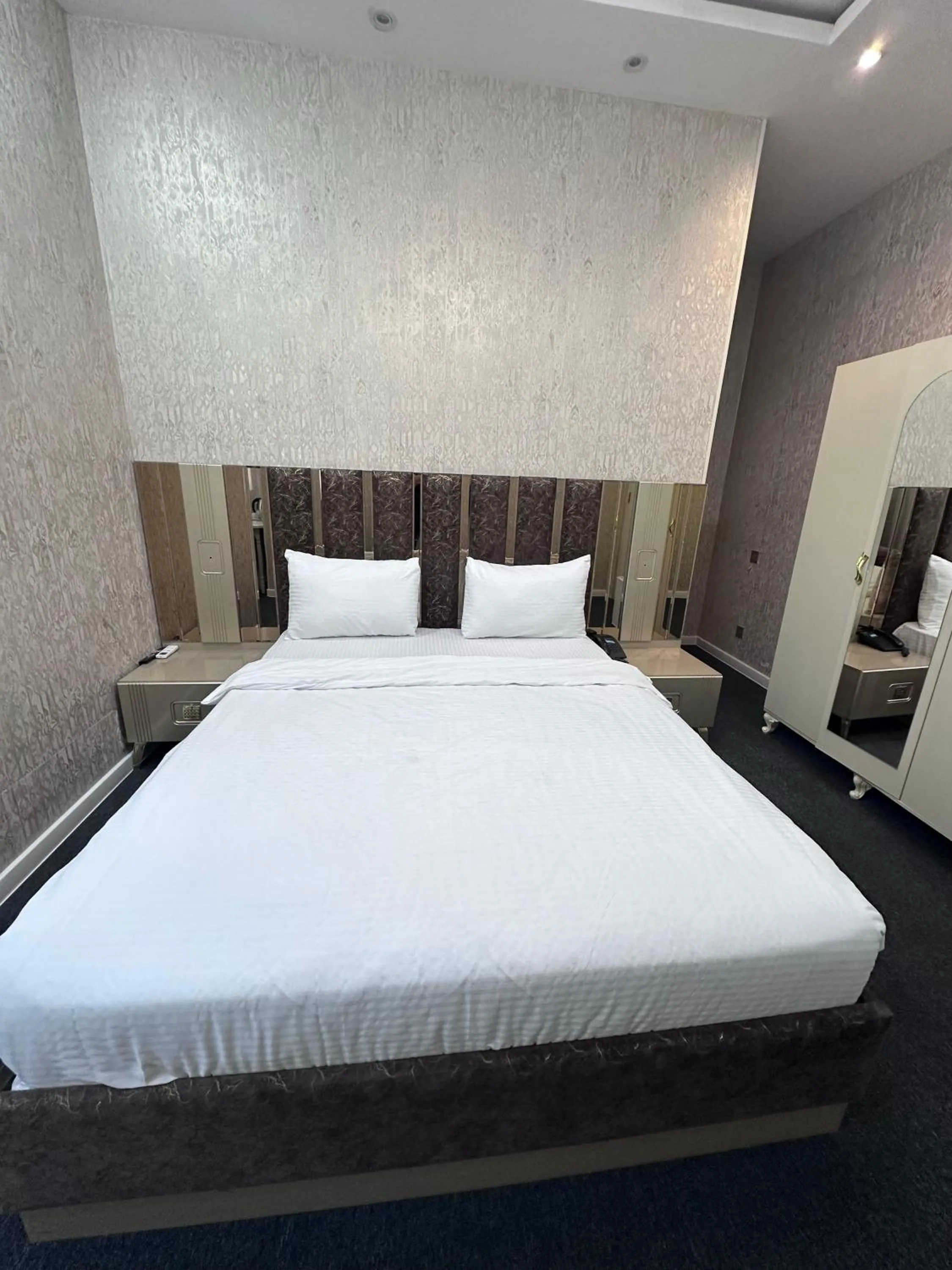 Bed in Central City Hotel