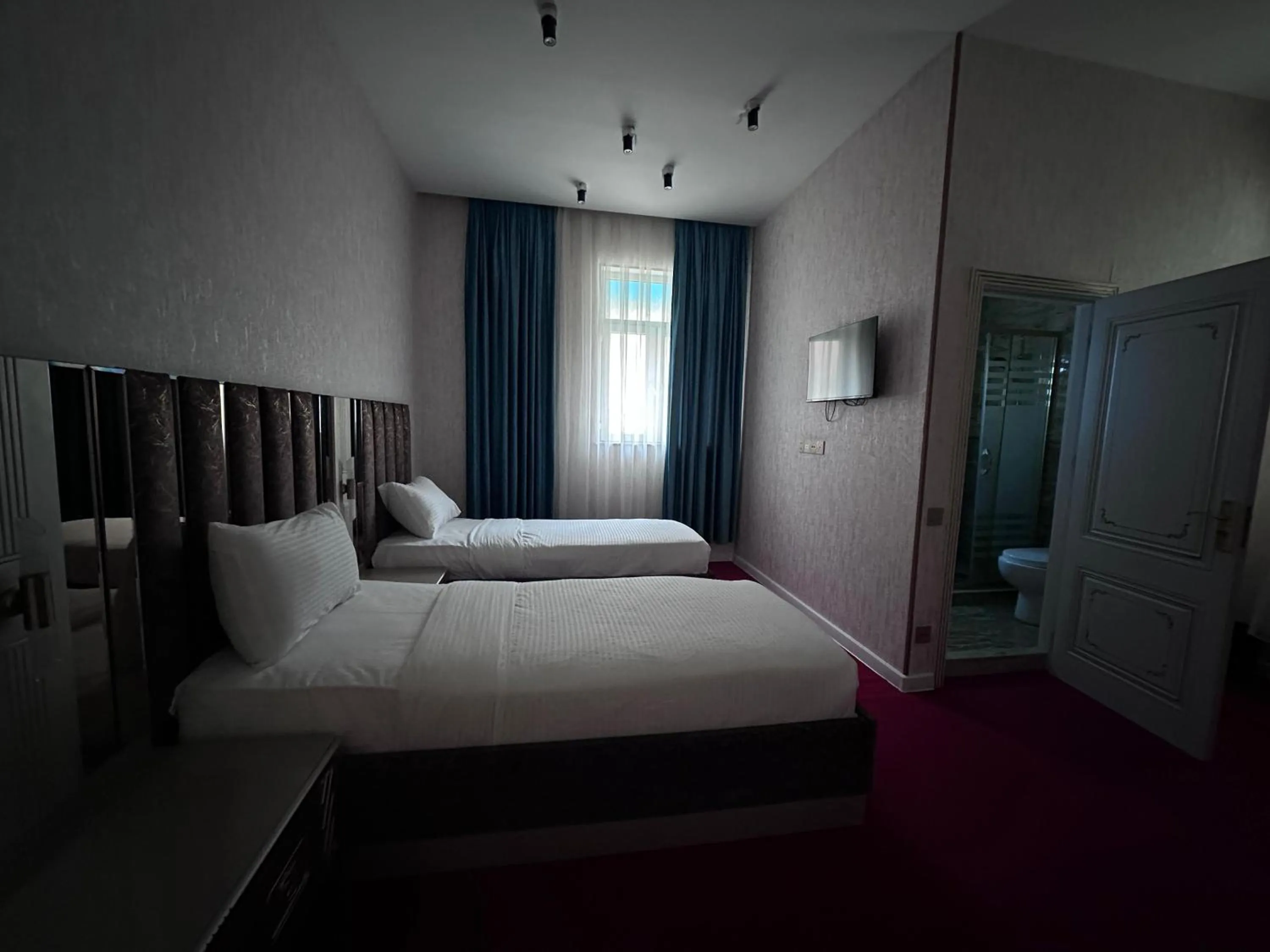 Bed in Central City Hotel