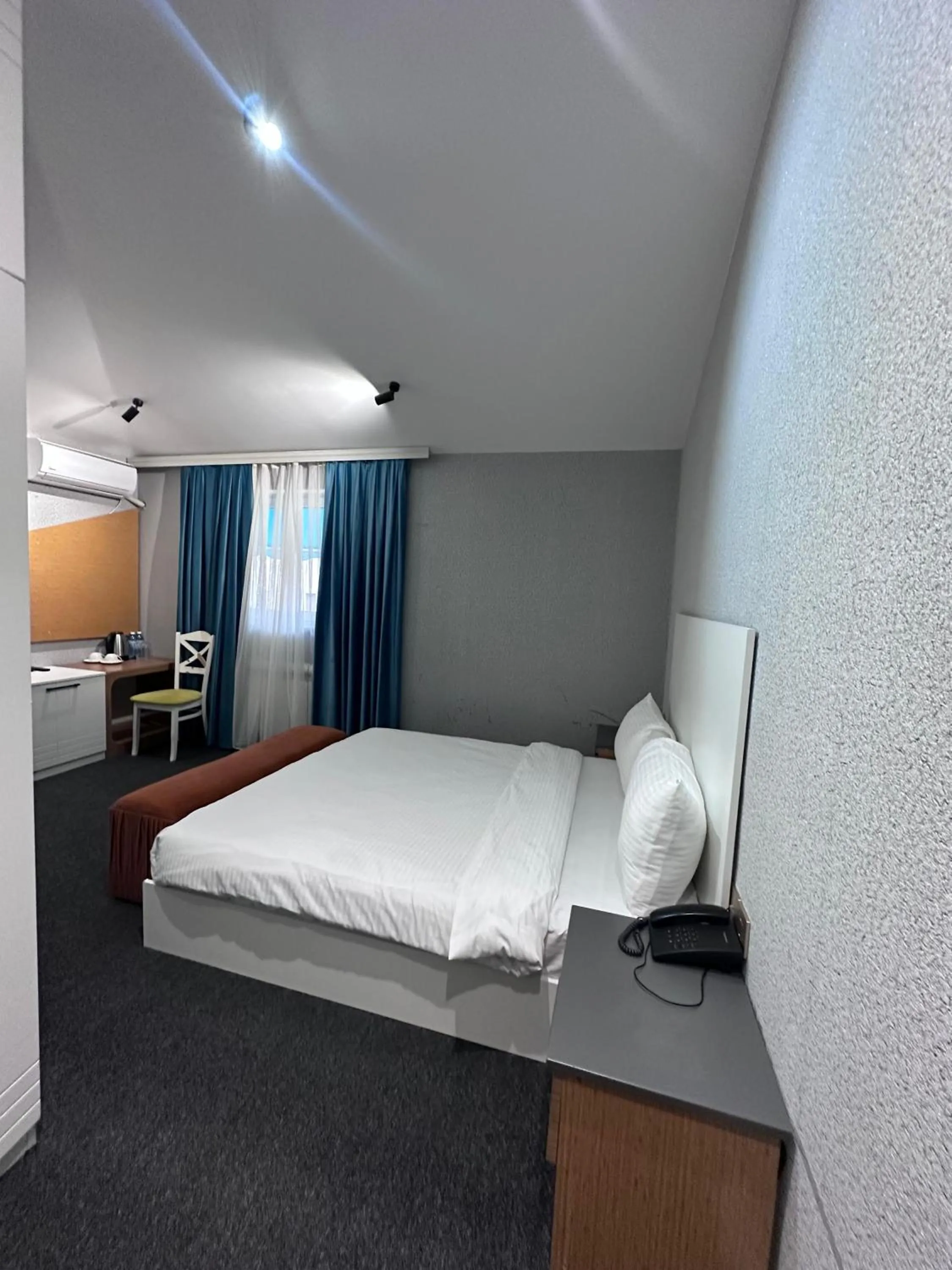 Bed in Central City Hotel