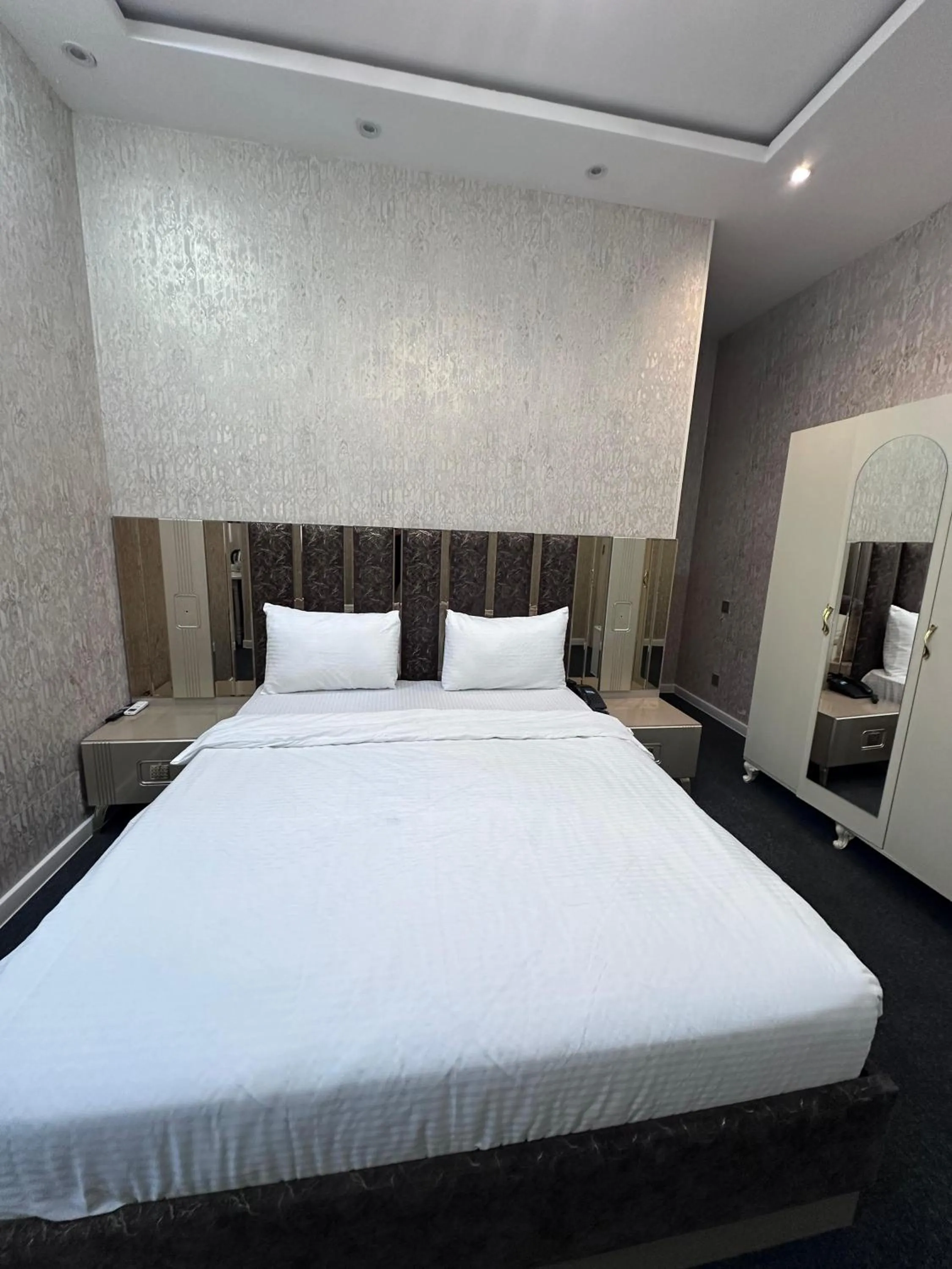 Bed in Central City Hotel