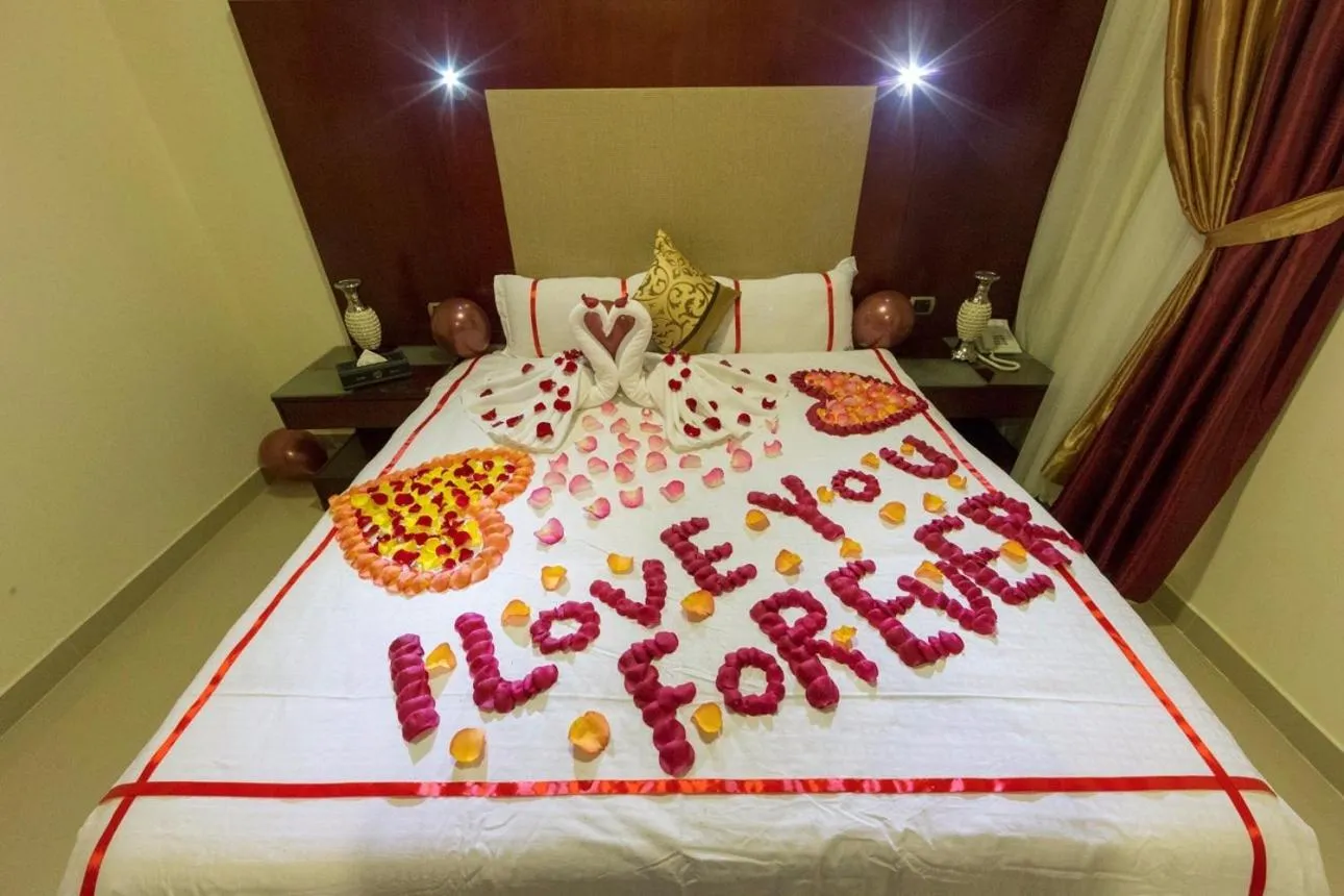 Bed in رؤوم ان للشقق الفندقية-Raoum Inn Hotel Apartments