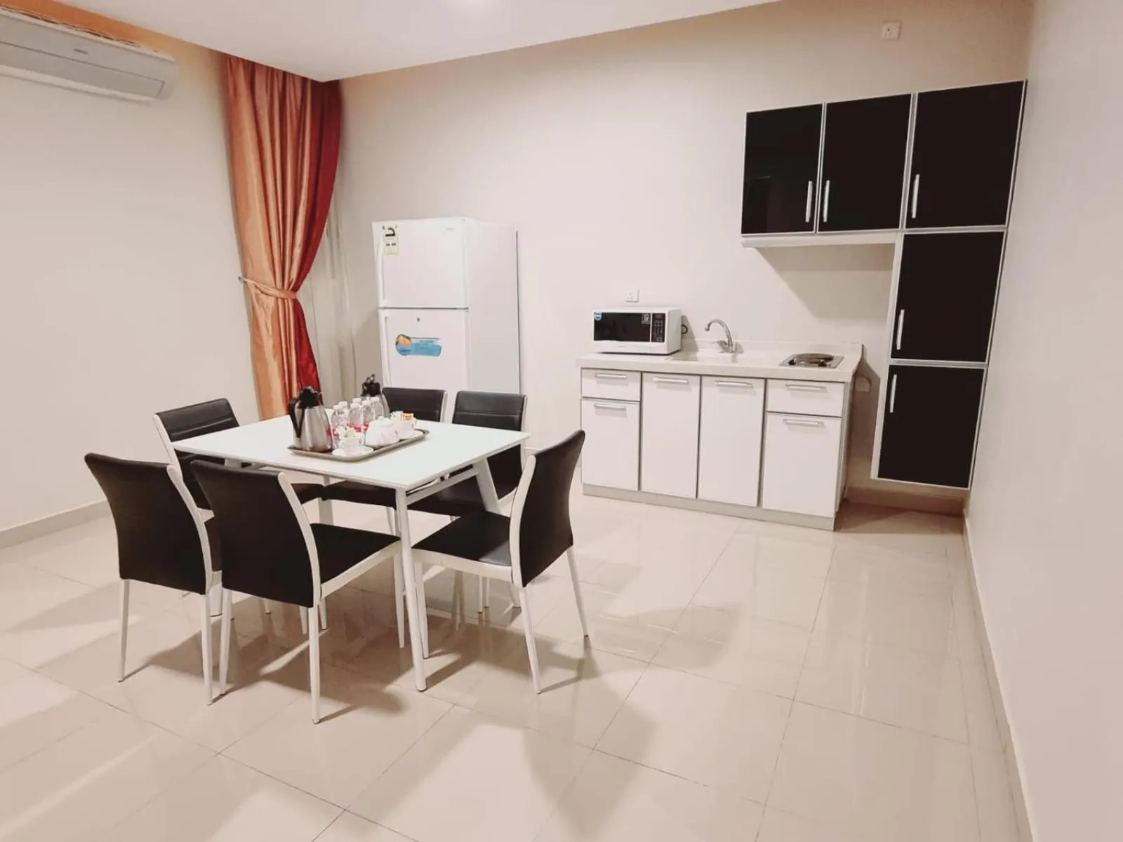 Kitchen or kitchenette in رؤوم ان للشقق الفندقية-Raoum Inn Hotel Apartments