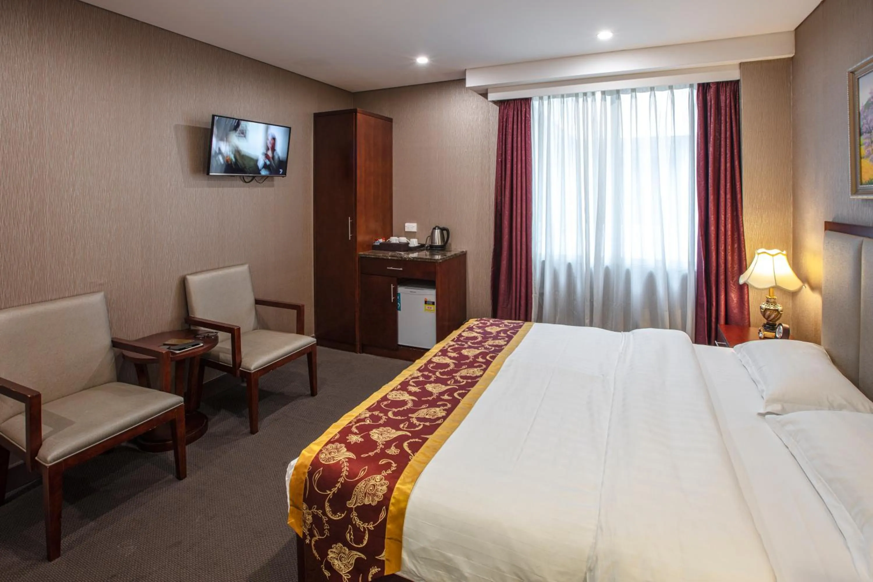 Bed in Megaboom City Hotel