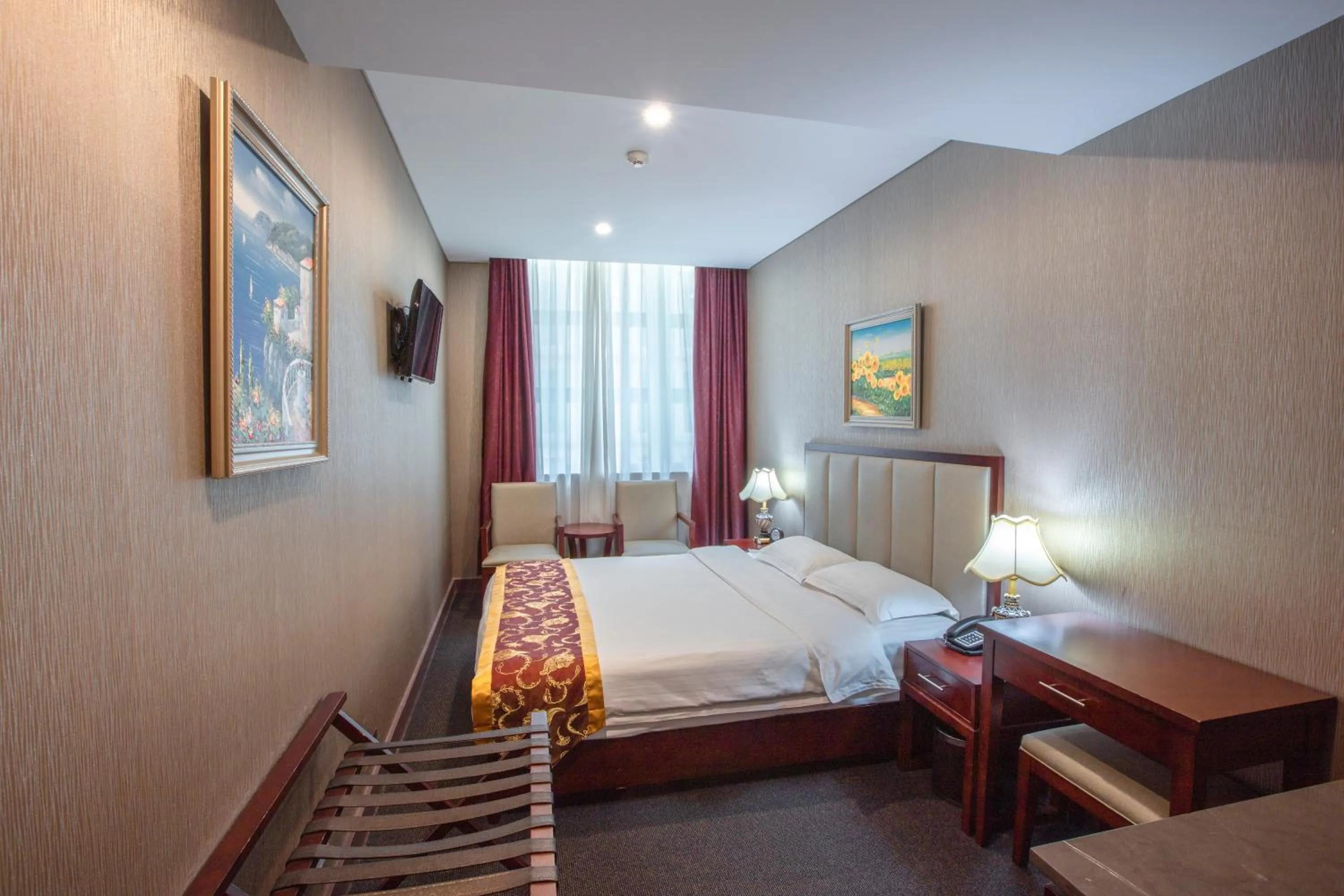 Bed in Megaboom City Hotel