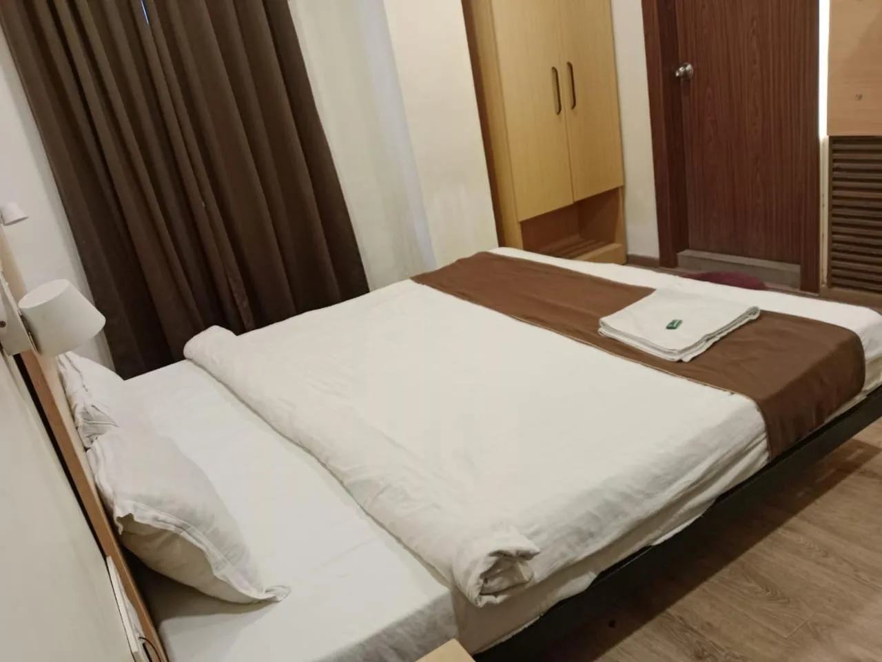 Bed in Hotel Ambika Grand