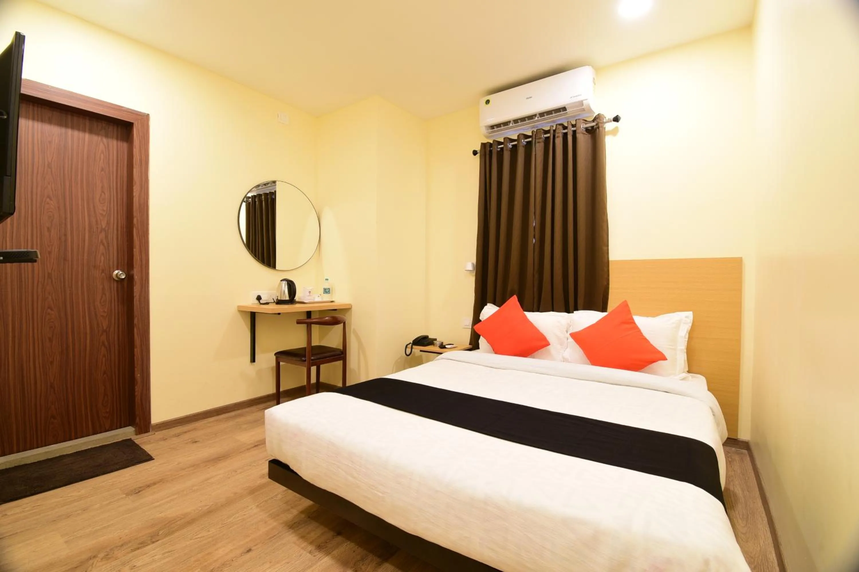 Bed in Hotel Ambika Grand