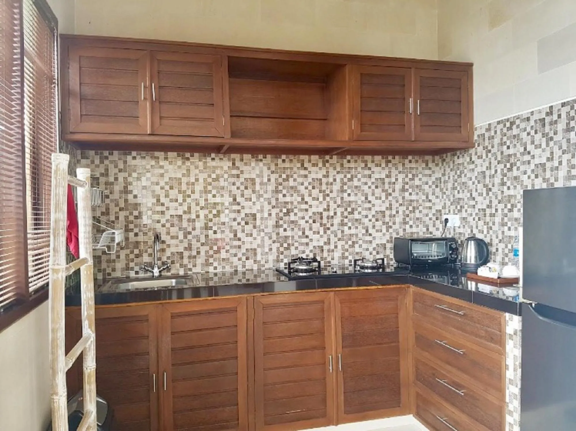 Kitchen or kitchenette in Uma Padi Villa