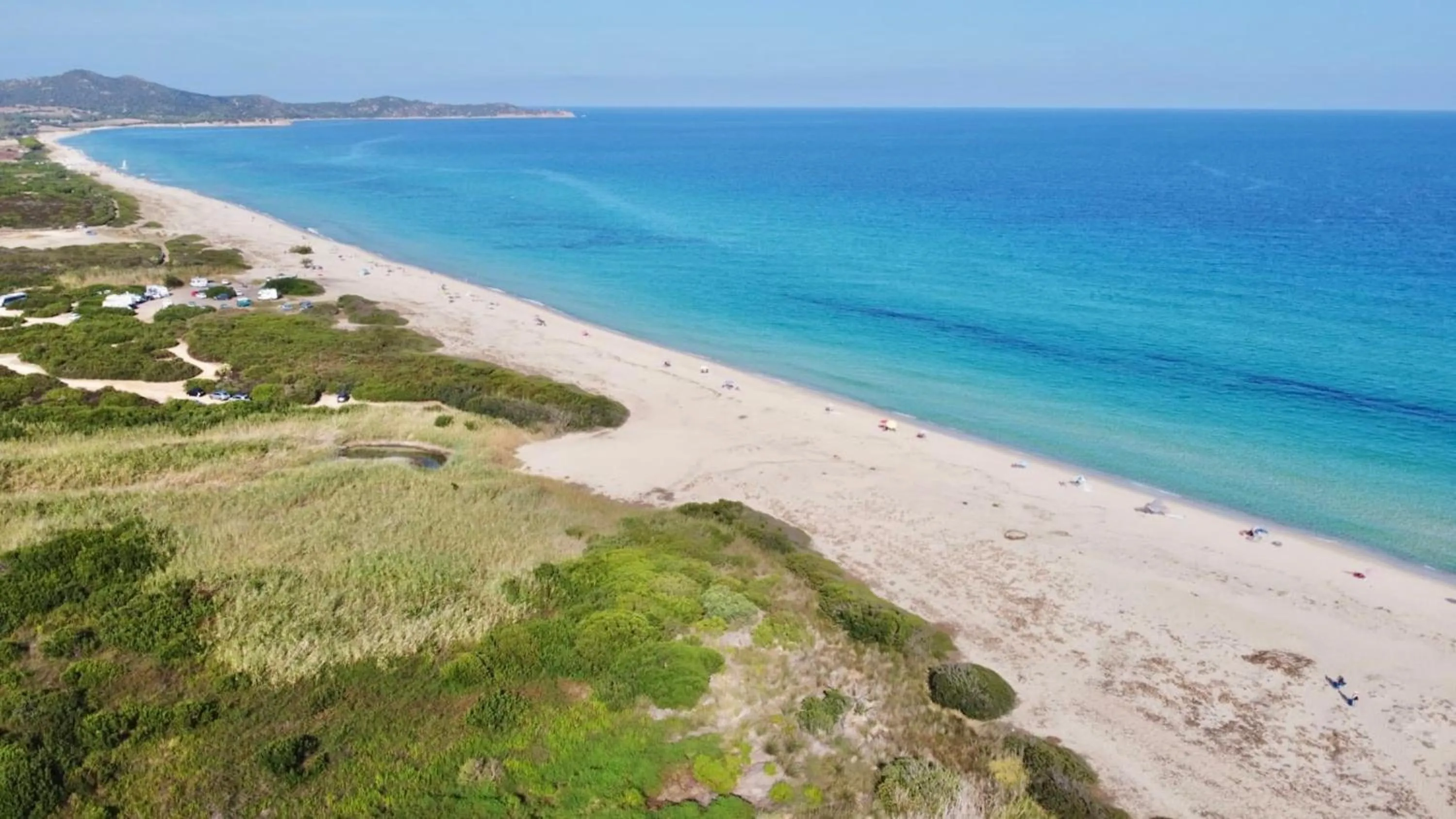 Beach in ISA - Residence in Costa Rei just 450 meters from the beach, apartments with air conditioning and outdoor private area