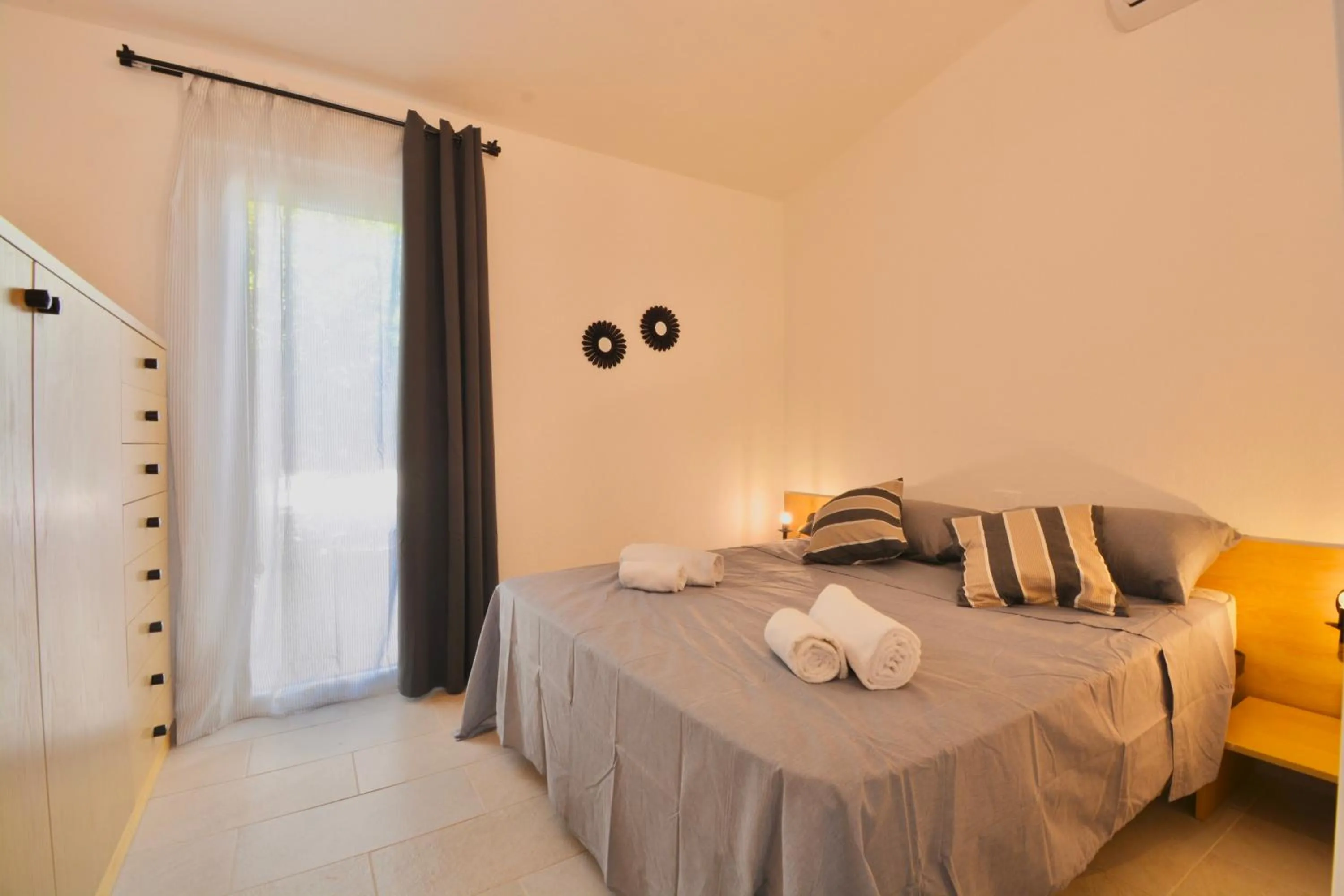 Bedroom, Bed in ISA - Residence in Costa Rei just 450 meters from the beach, apartments with air conditioning and outdoor private area