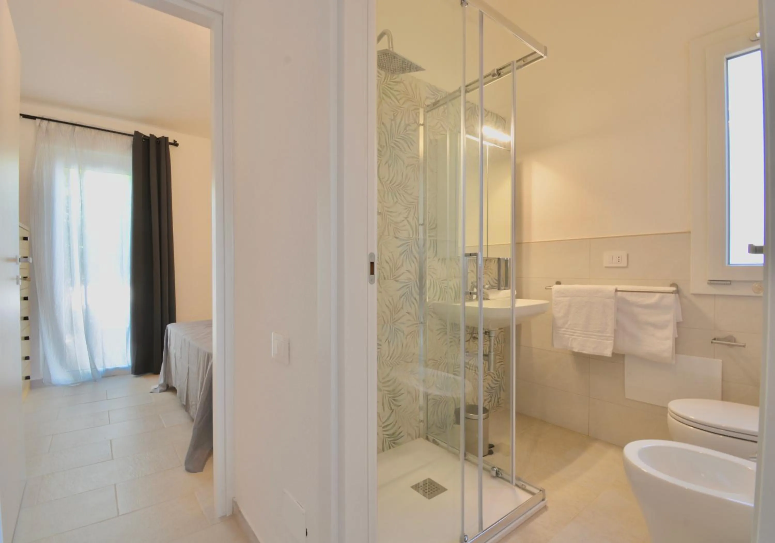 Bathroom in ISA - Residence in Costa Rei just 450 meters from the beach, apartments with air conditioning and outdoor private area