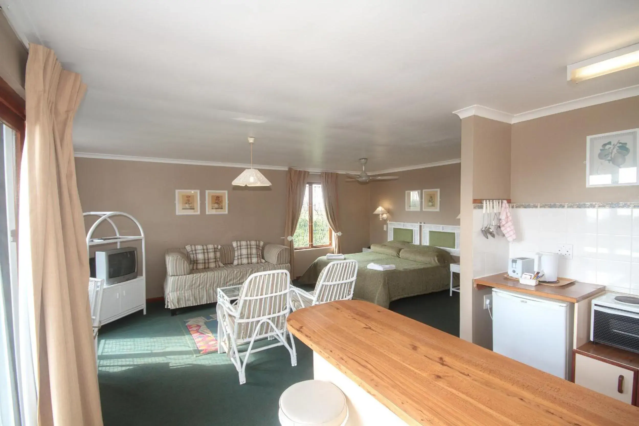 Living room in Pine Lodge Resort Living room in Pine Lodge Resort