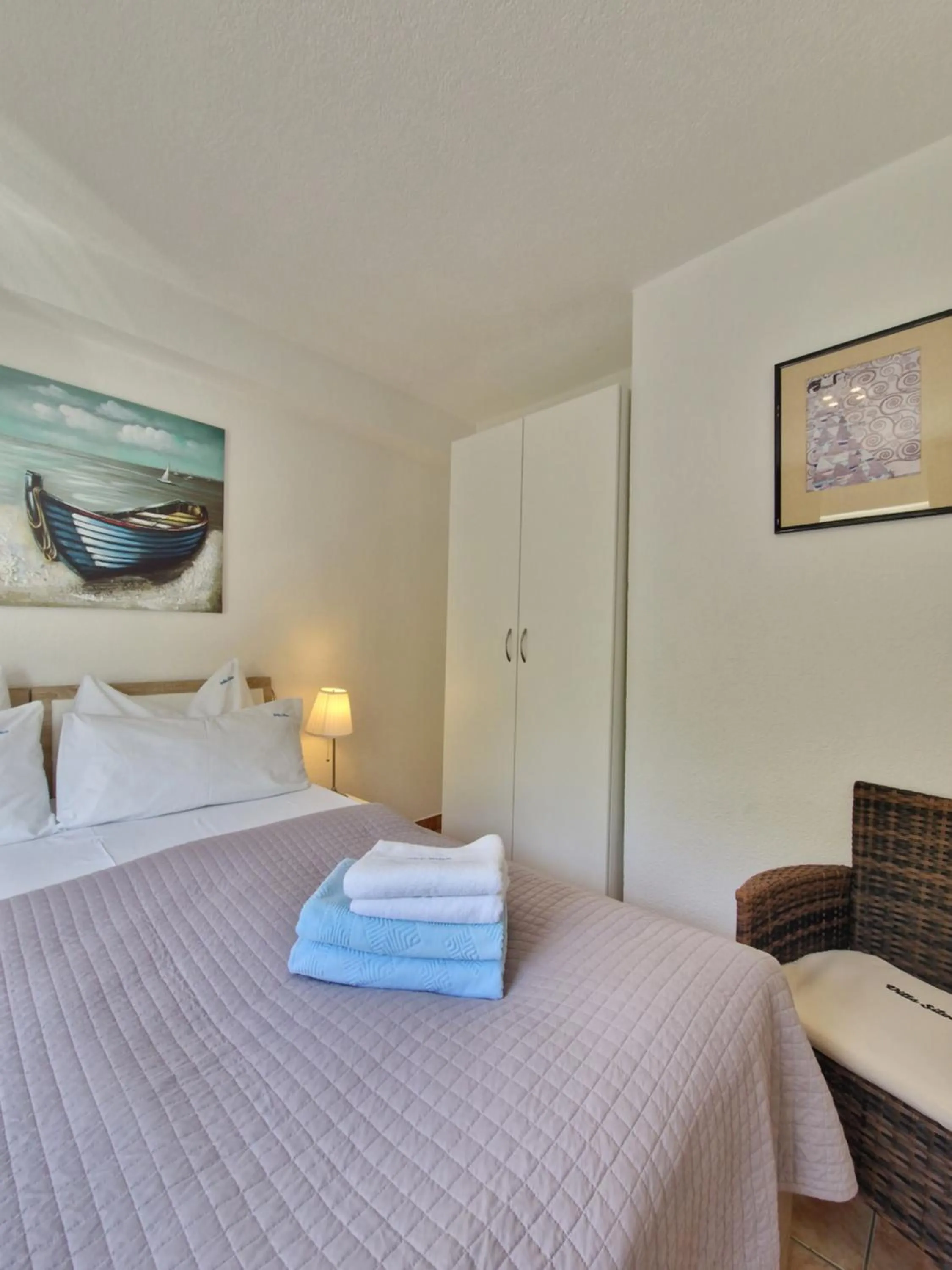 Bed in Apartments Silva with a view of sea