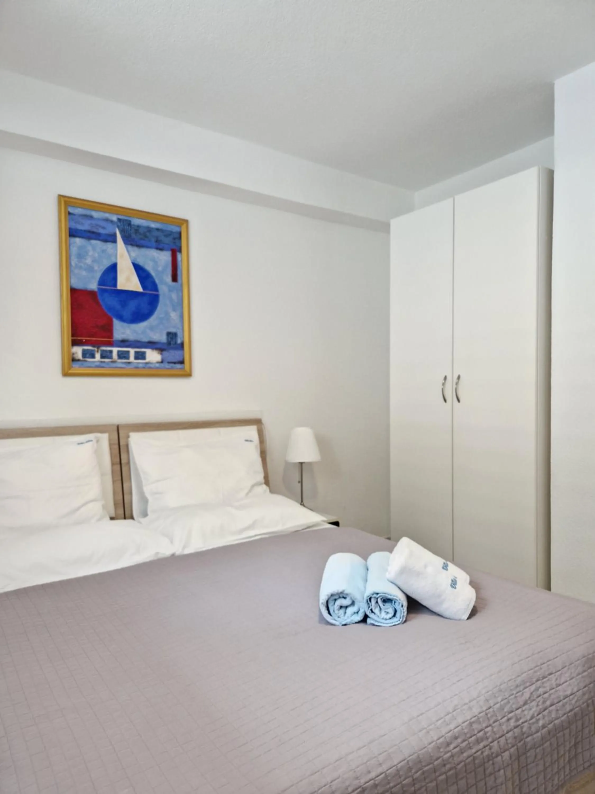 Bed in Apartments Silva with a view of sea