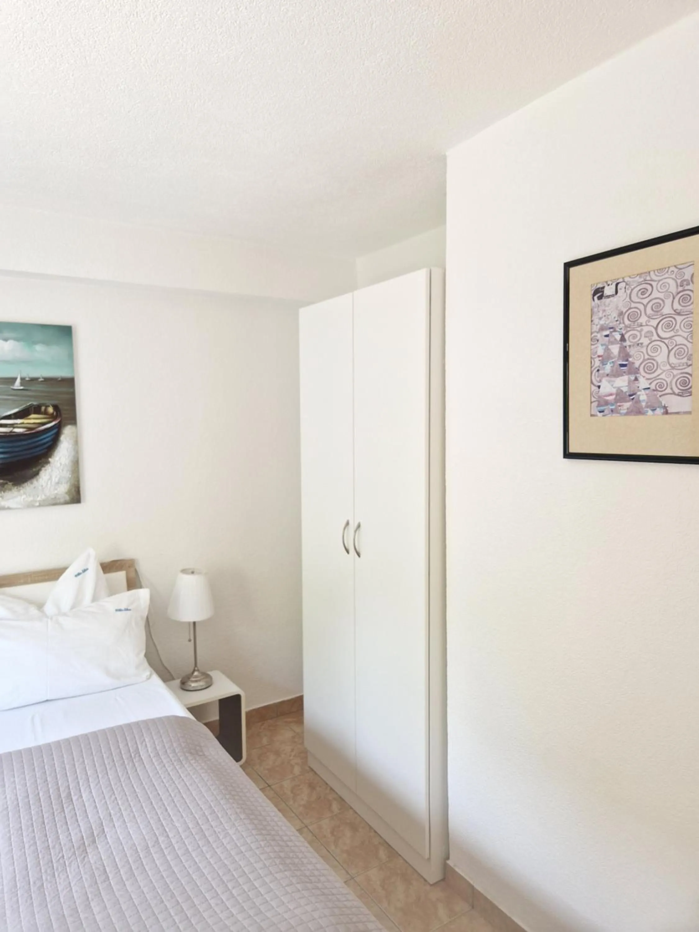 Bed in Apartments Silva with a view of sea