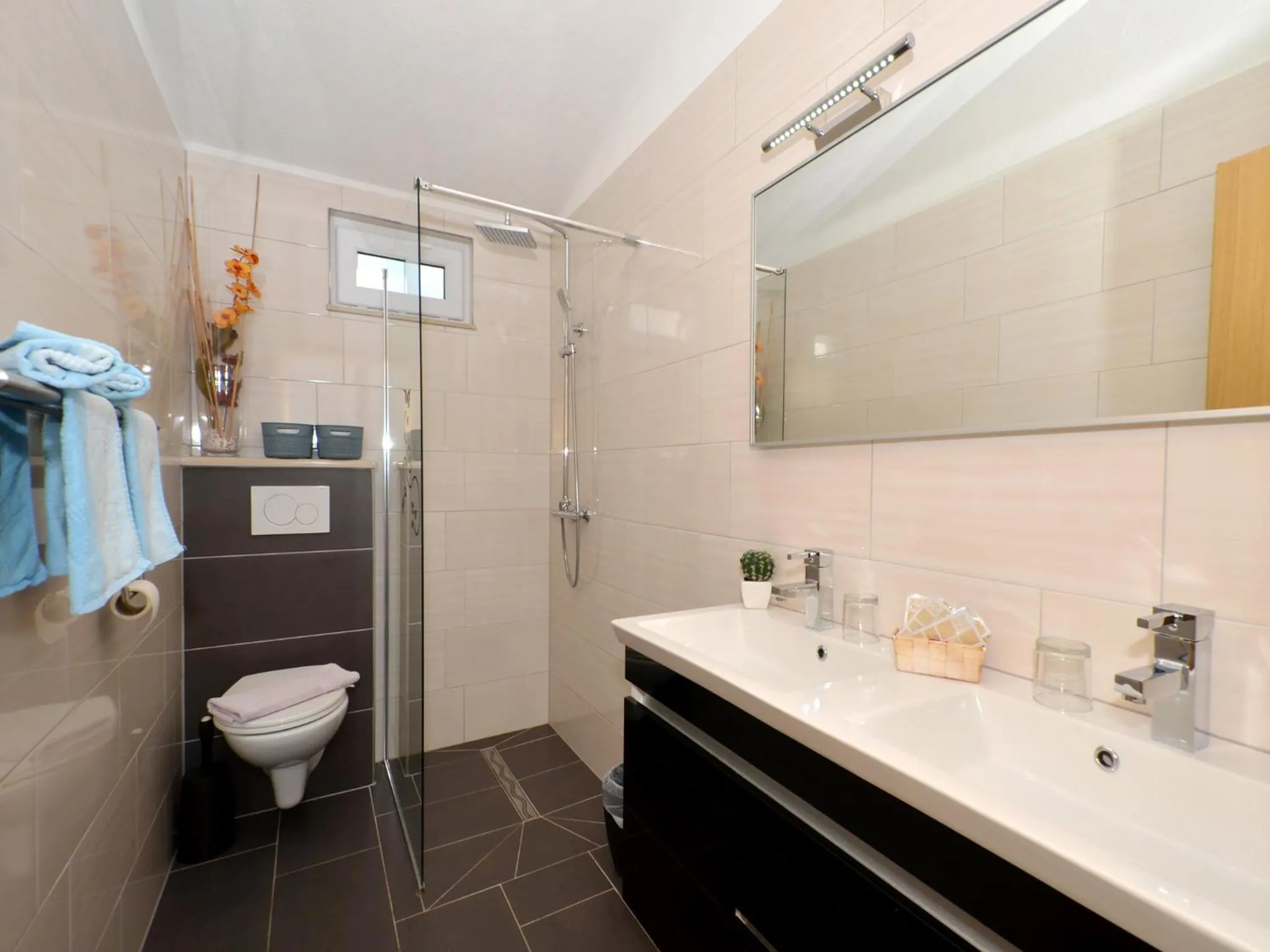 Bathroom in Apartments Silva with a view of sea