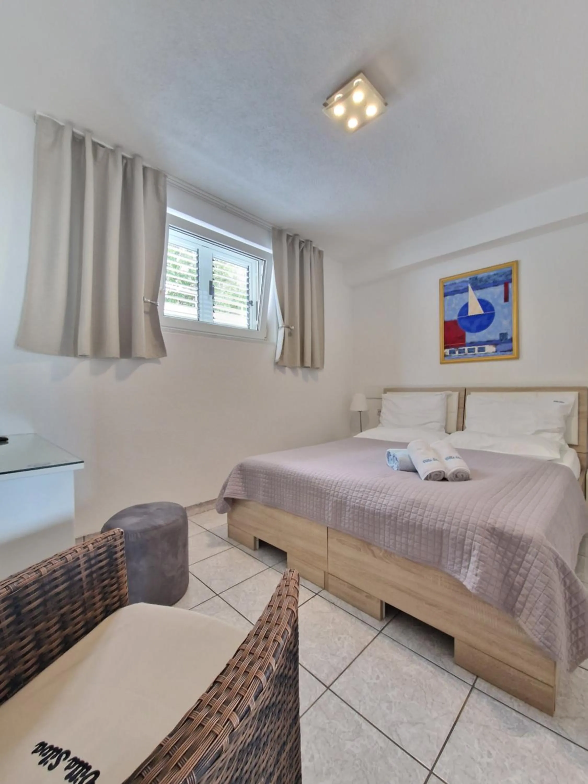 Bed in Apartments Silva with a view of sea