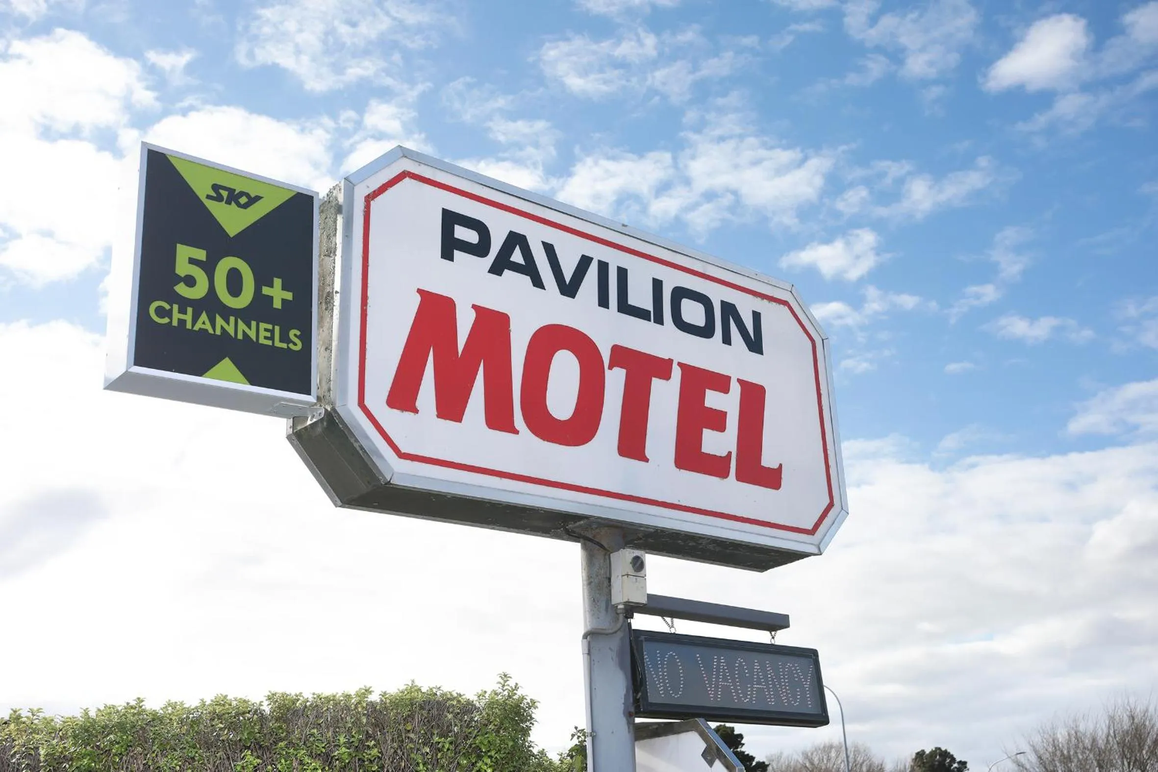 Property logo or sign in Pavilion Motel & Conference Centre