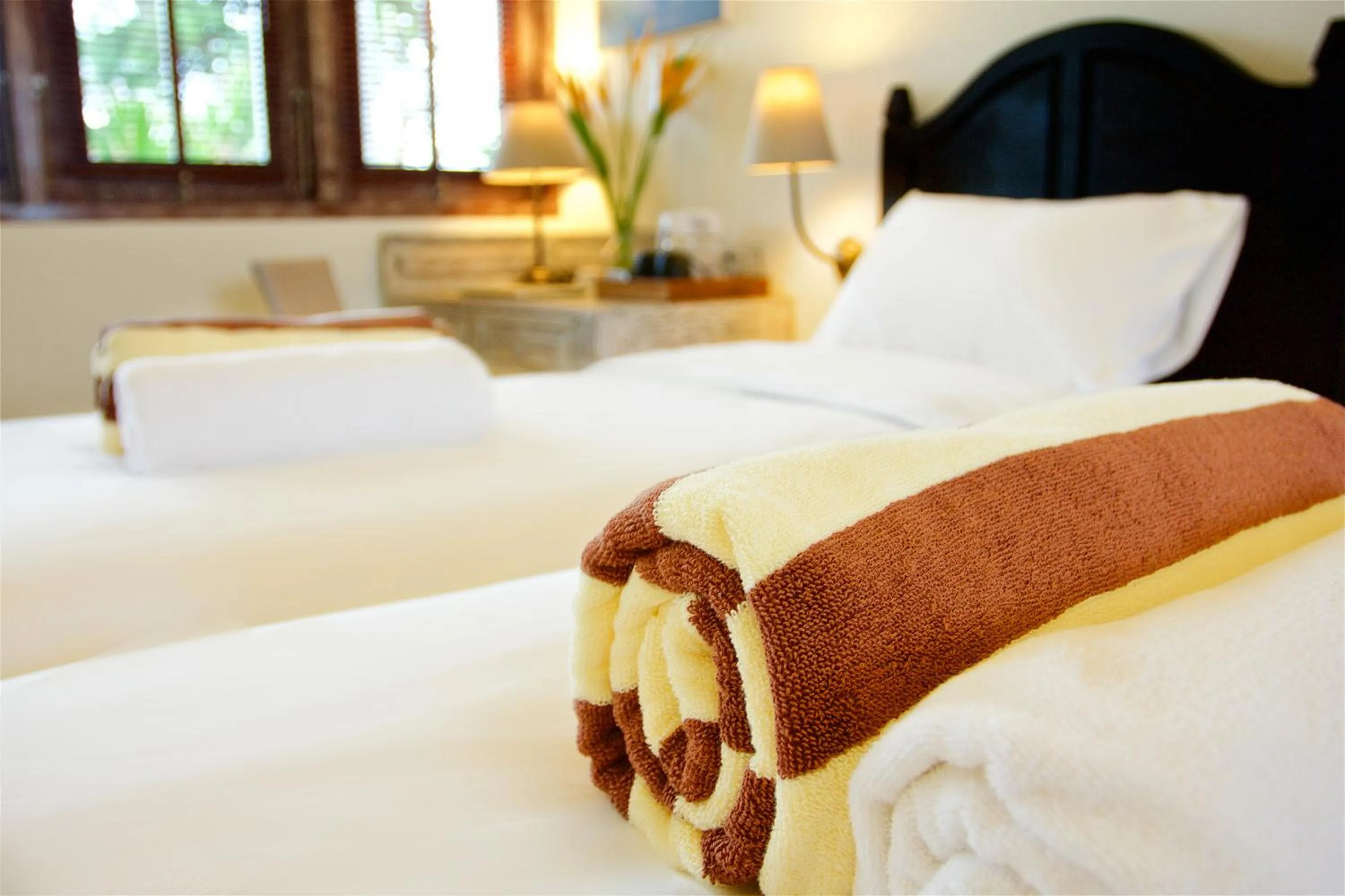 Bed in OK Divers Resort & Spa