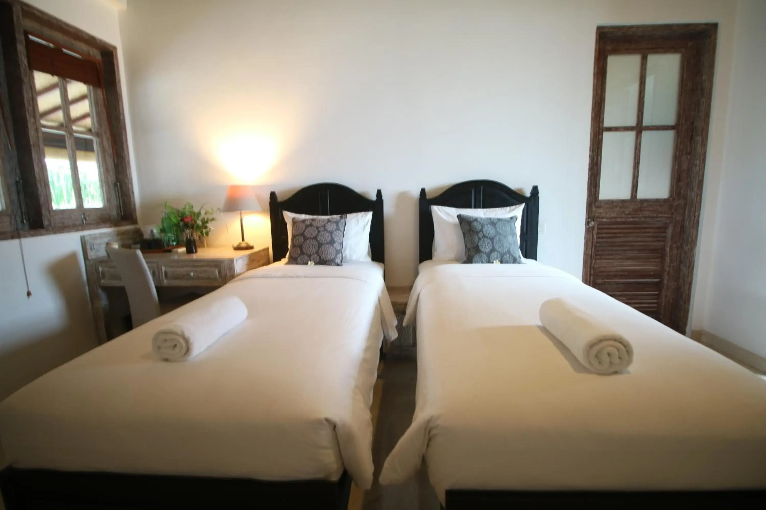 Bed in OK Divers Resort & Spa Bed in OK Divers Resort & Spa