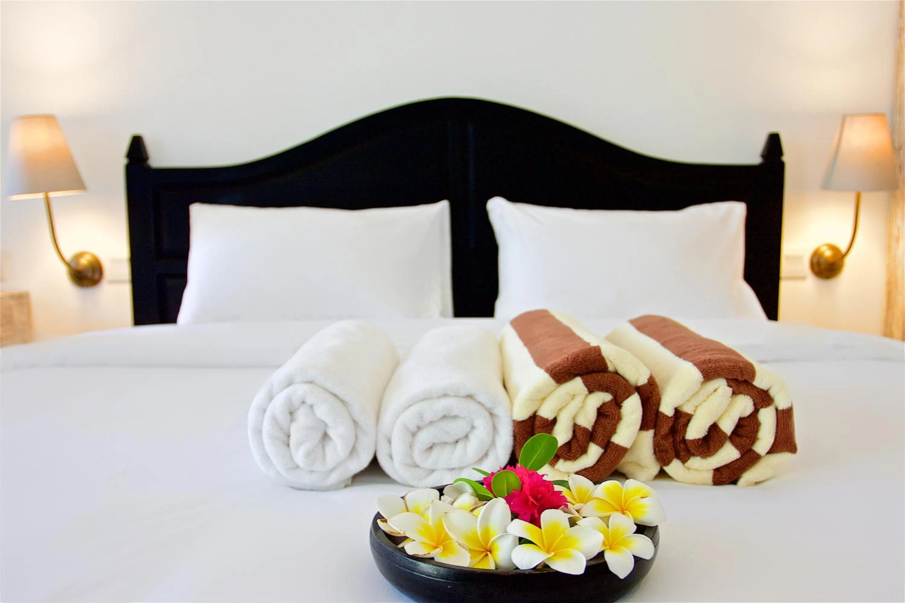 Bed in OK Divers Resort & Spa