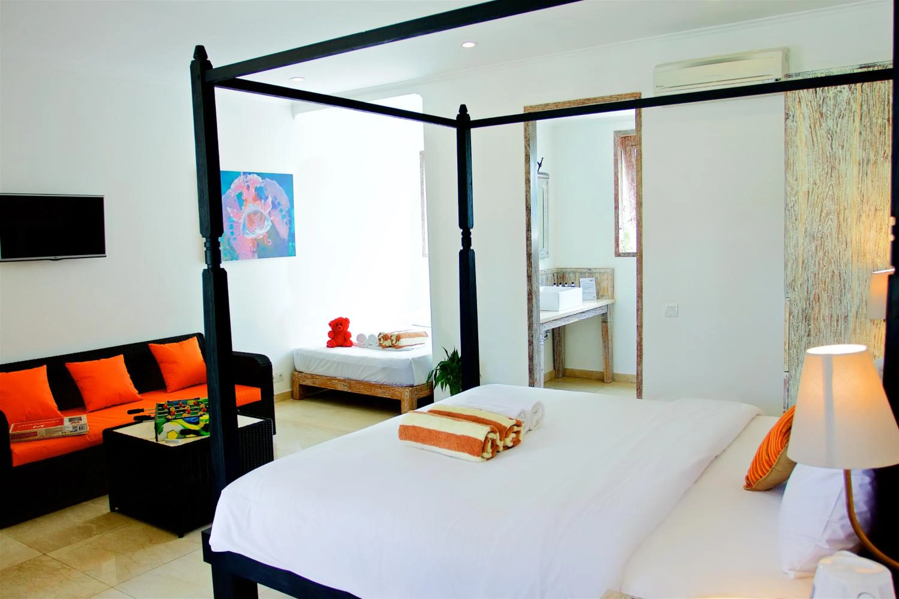 Bed in OK Divers Resort & Spa