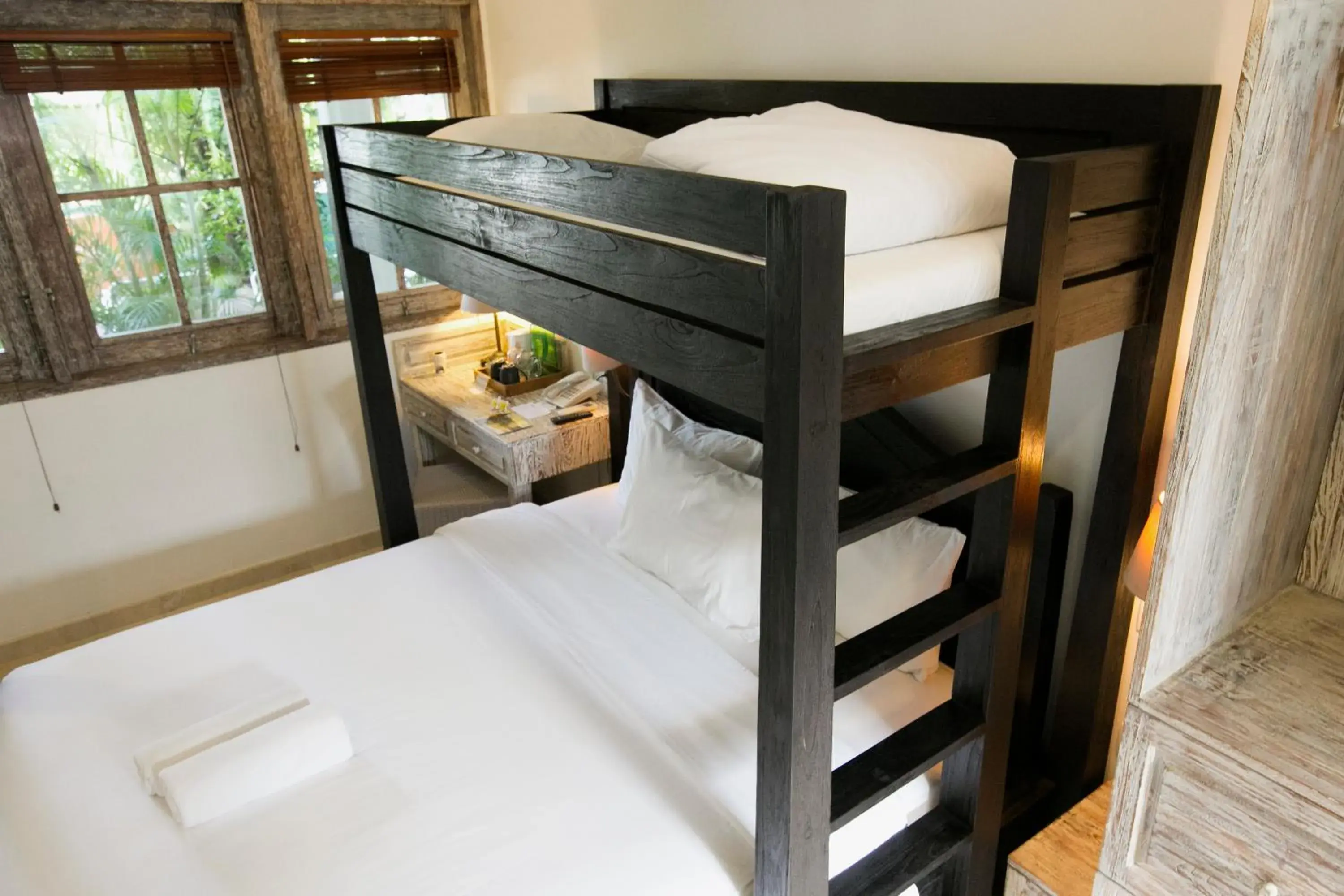 Bed in OK Divers Resort & Spa Bed in OK Divers Resort & Spa
