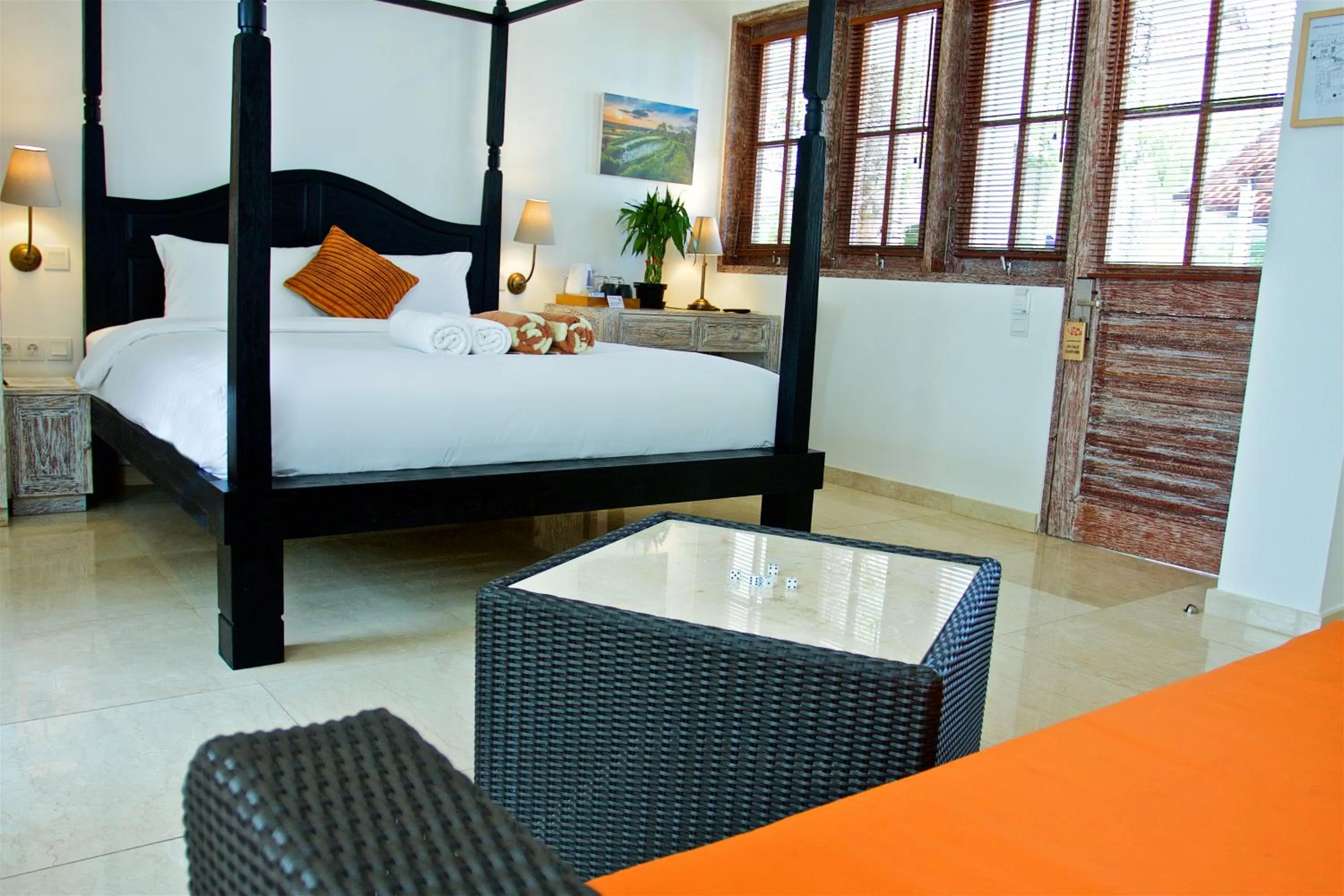 Bed in OK Divers Resort & Spa