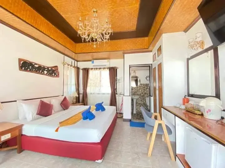 Communal lounge/ TV room, Bed in Koh Chang Resort Communal lounge/ TV room, Bed in Koh Chang Resort