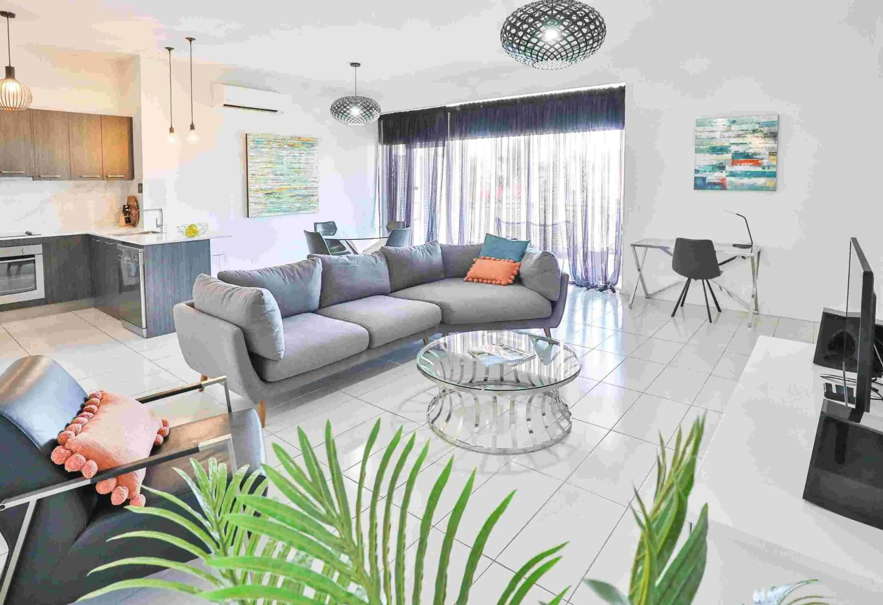 Living room in Indulge Apartments - CBD