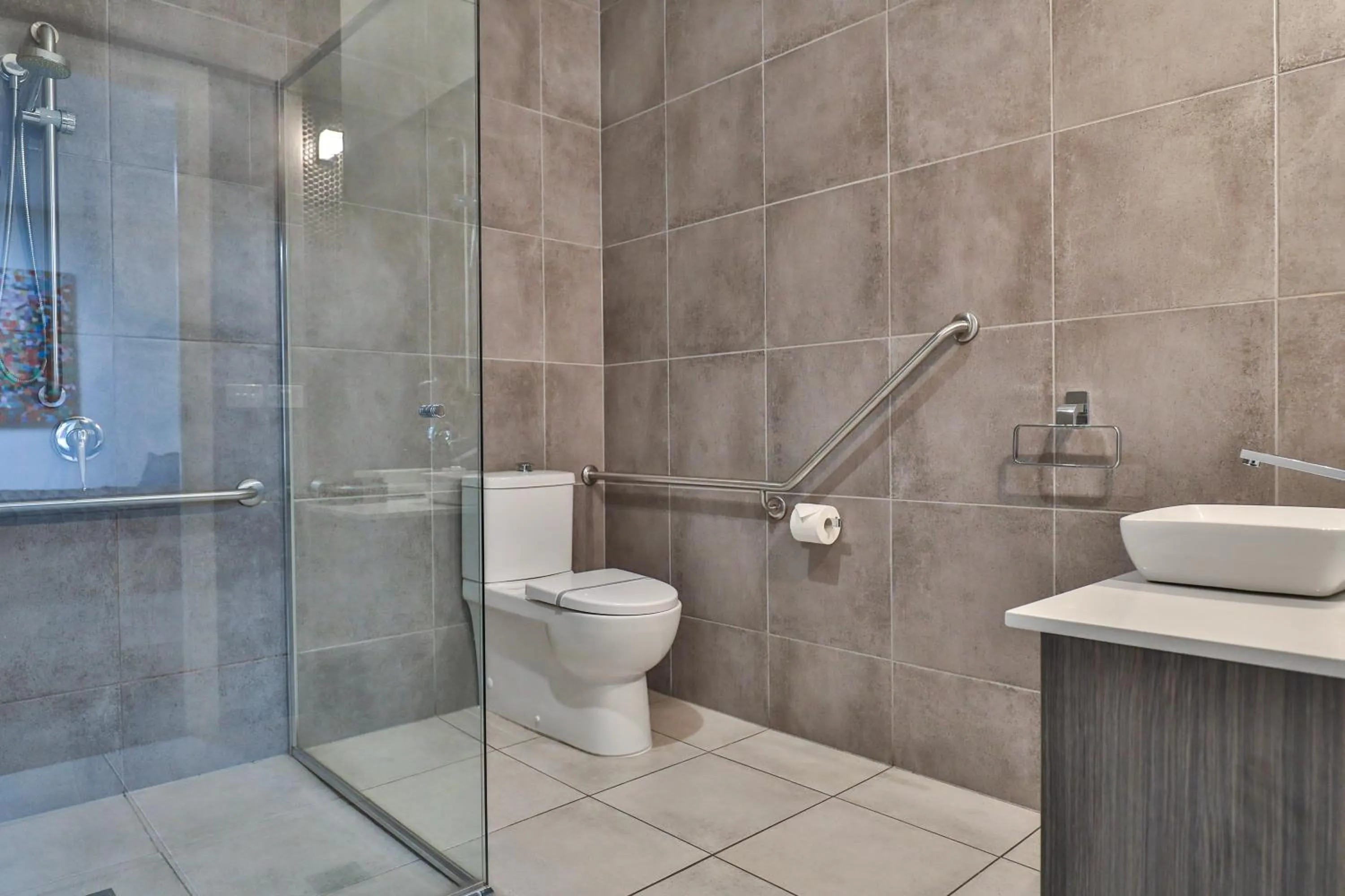 Toilet in Indulge Apartments - CBD