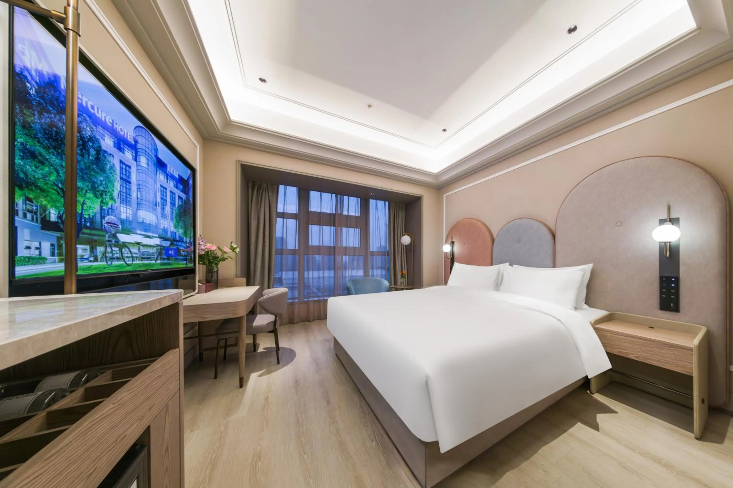 Bed in Mercure Wuxi East Railway Station