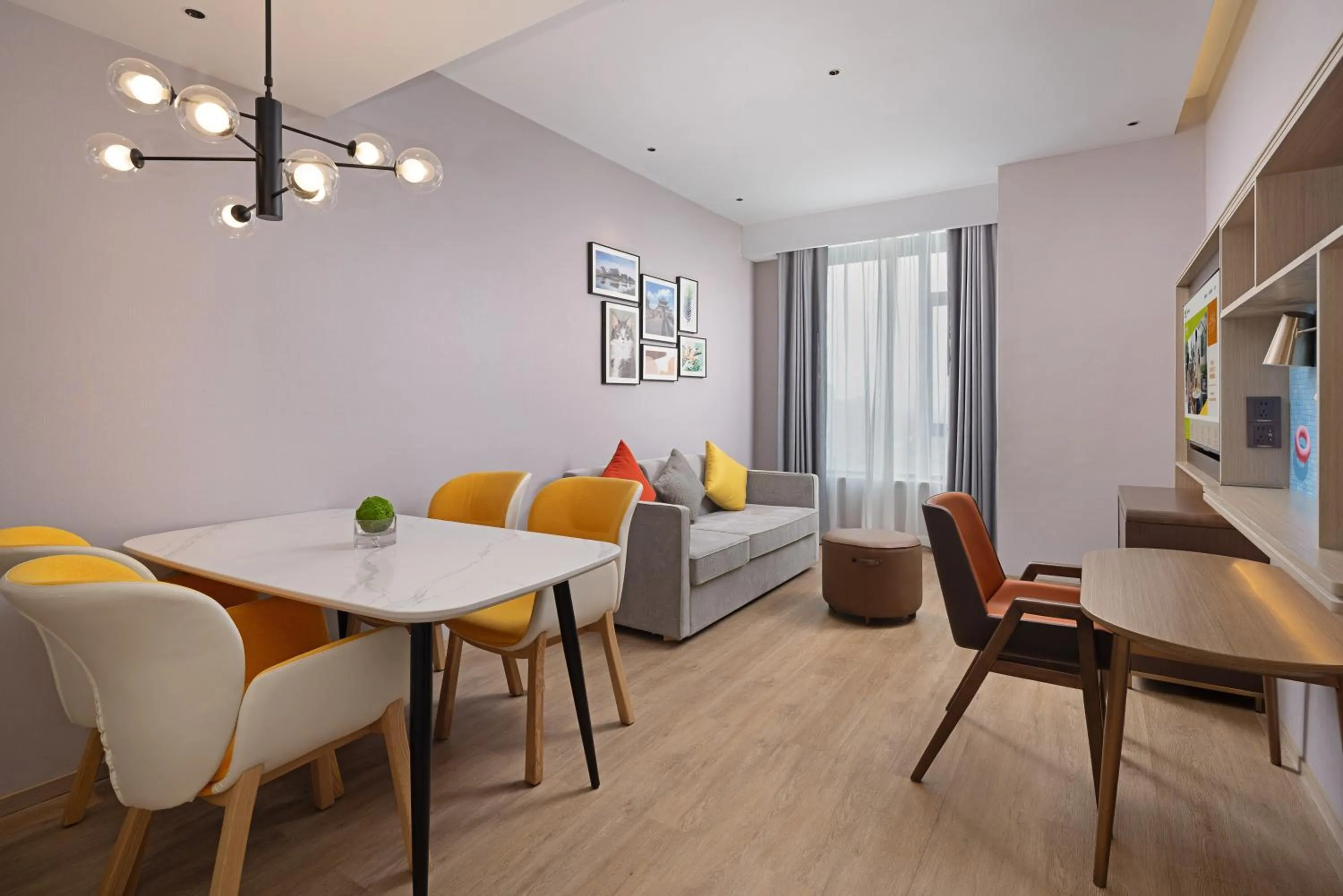 Living room in Home2 Suite by Hilton Jingzhou Wanda Plaza