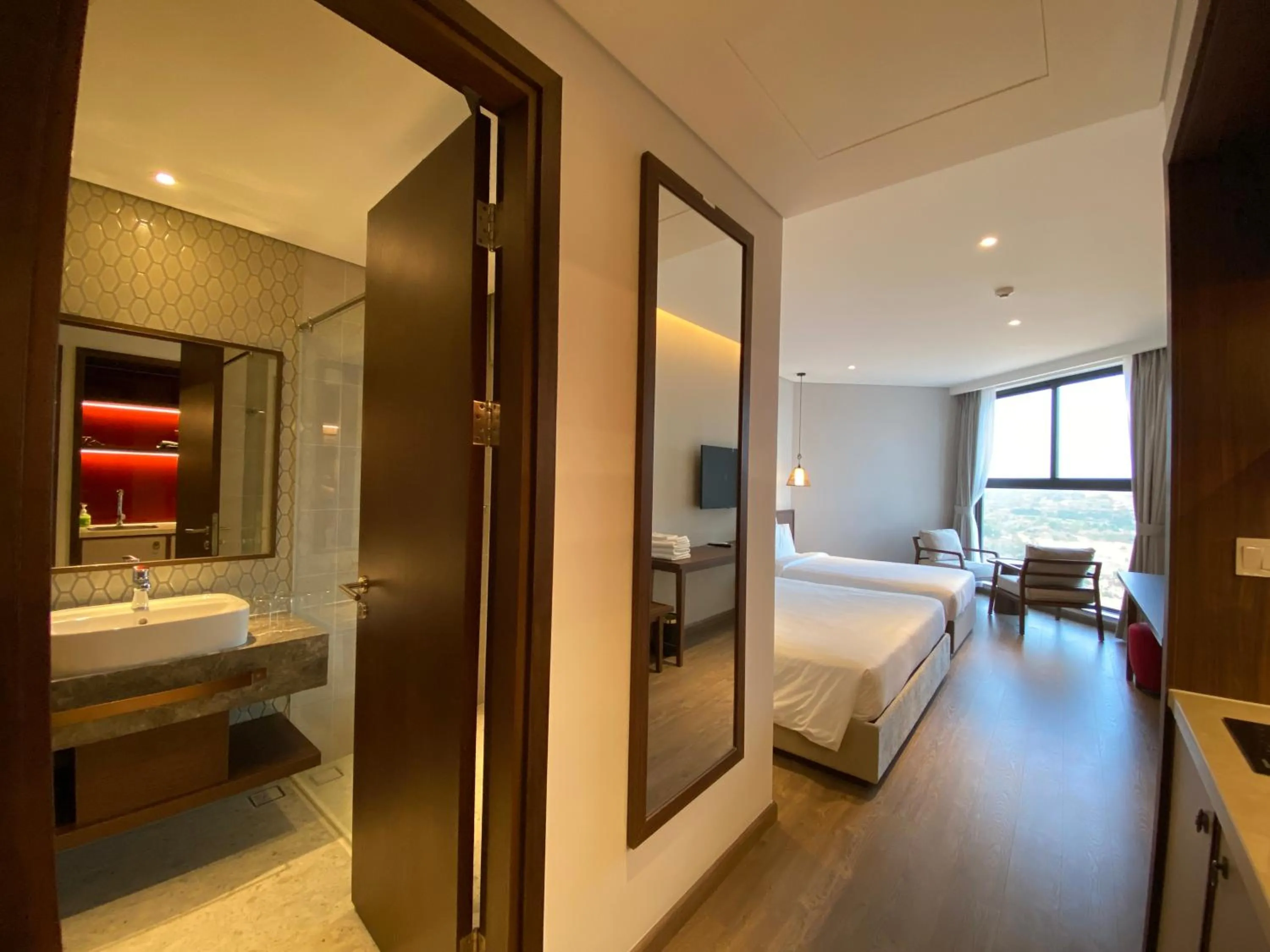 Photo of the whole room, Bed in Apec Mandala Ocean Retreat- Mui Ne