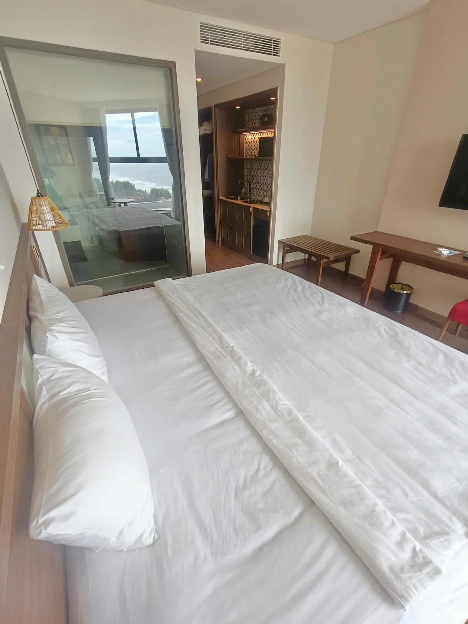 Photo of the whole room, Bed in Apec Mandala Ocean Retreat- Mui Ne