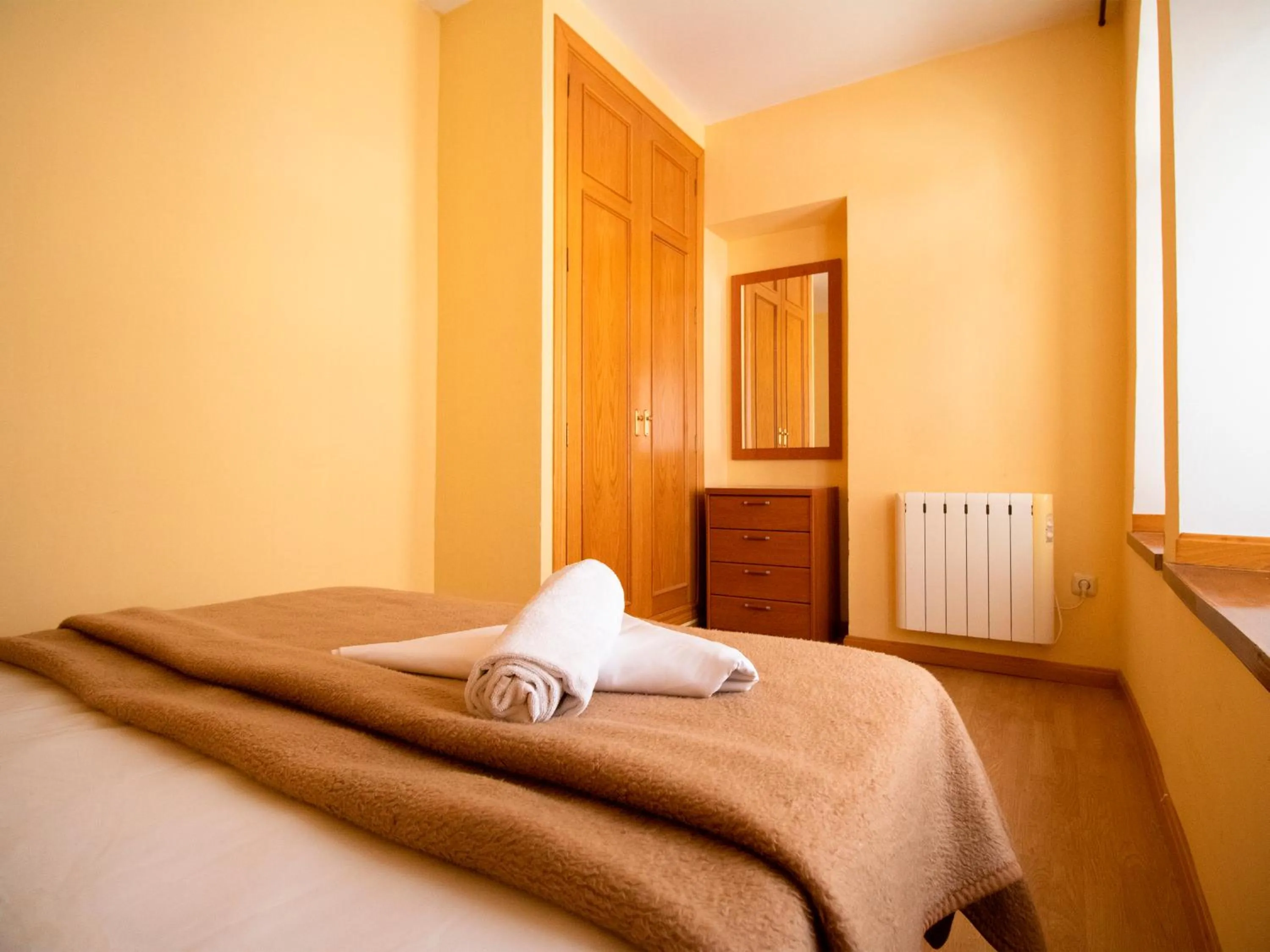 Bed in Apartamentos Canfranc 3000