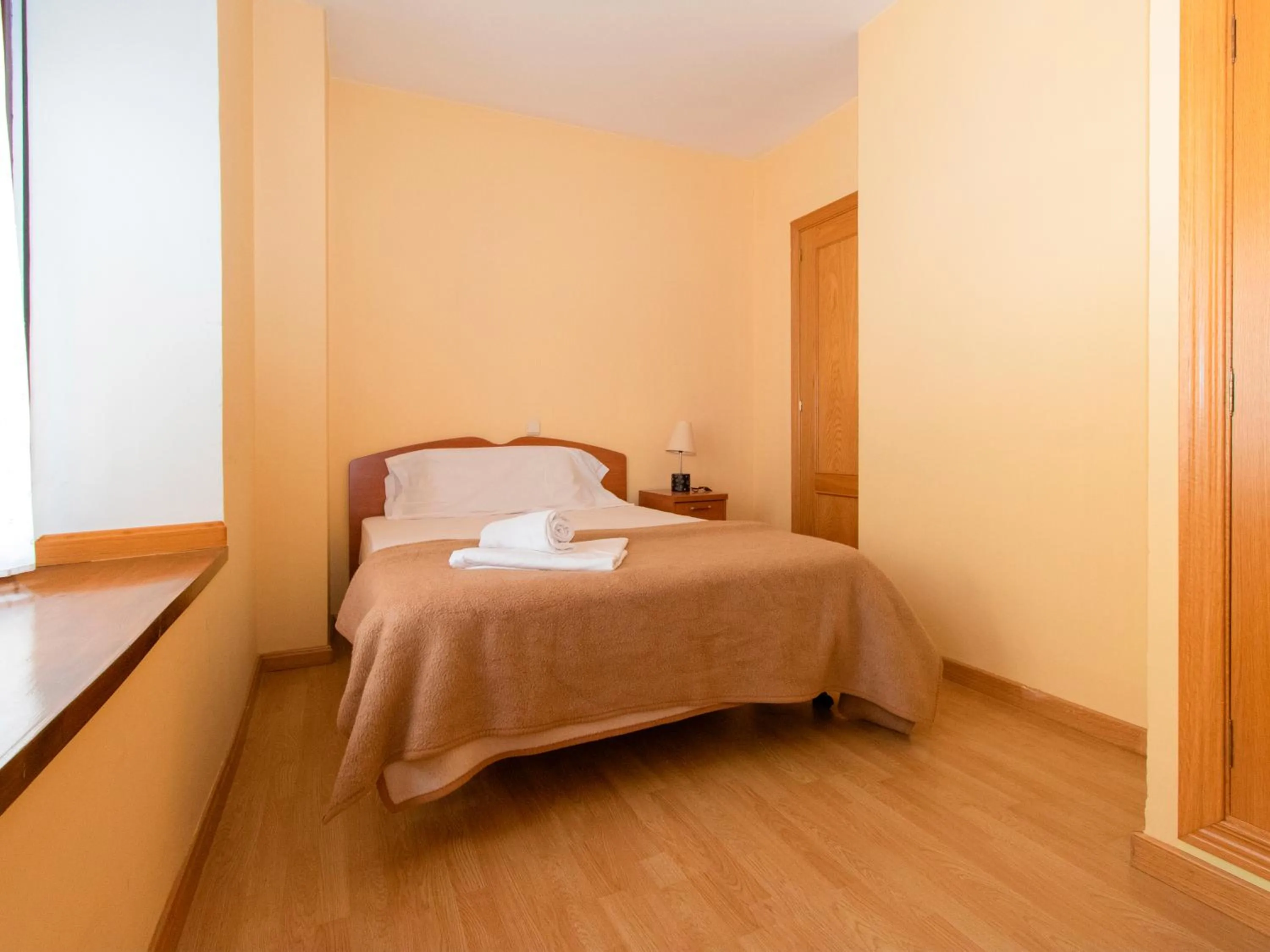 Bed in Apartamentos Canfranc 3000