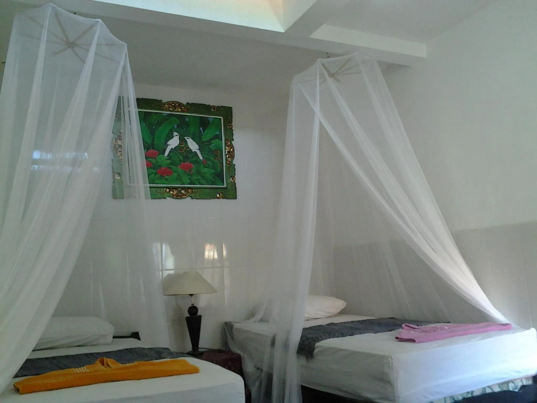 Photo of the whole room, Bed in Tirta Yoga Inn