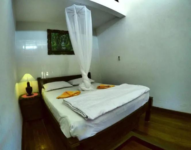 Photo of the whole room, Bed in Tirta Yoga Inn